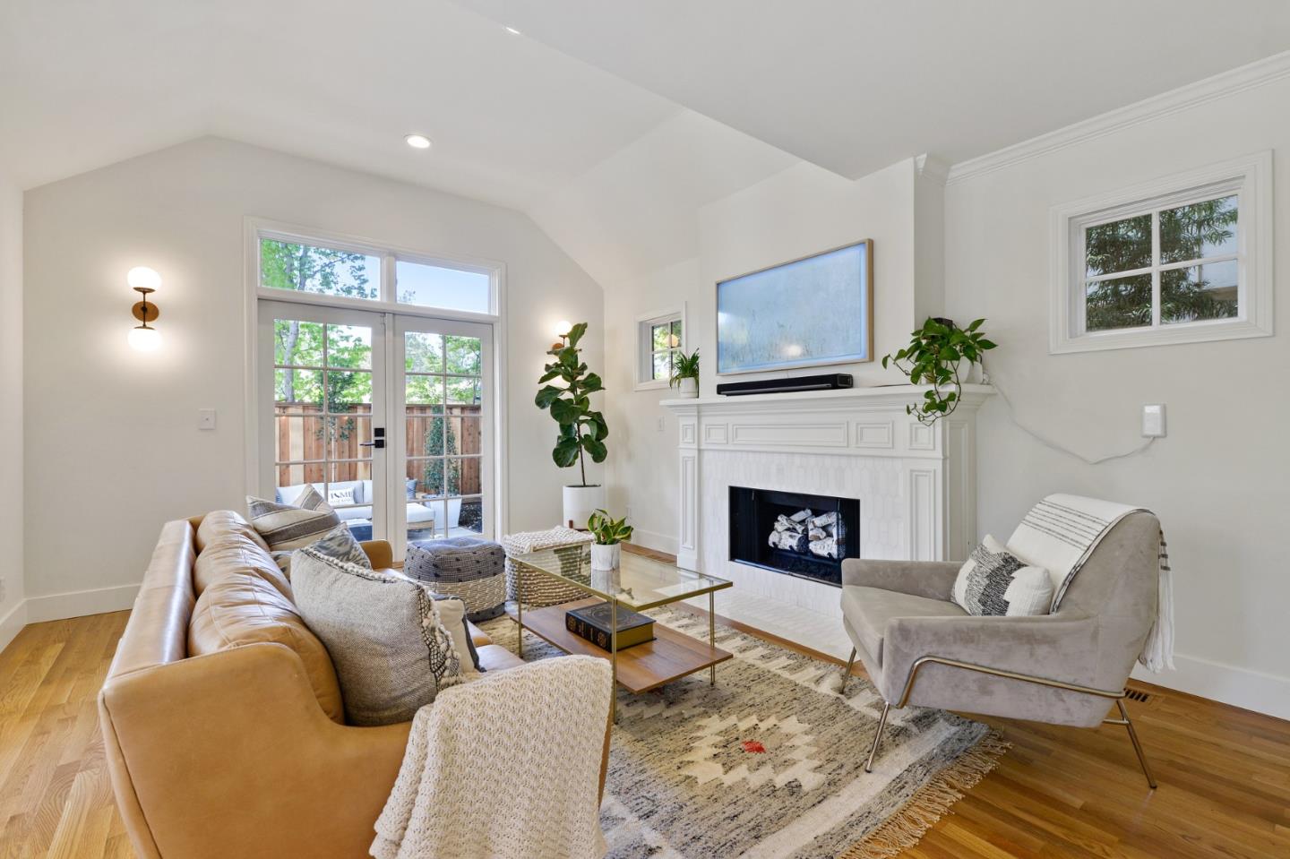 751 Partridge Avenue Menlo Park, CA 94025 - Photo 15 of 37 a living room with furniture a fireplace and windows