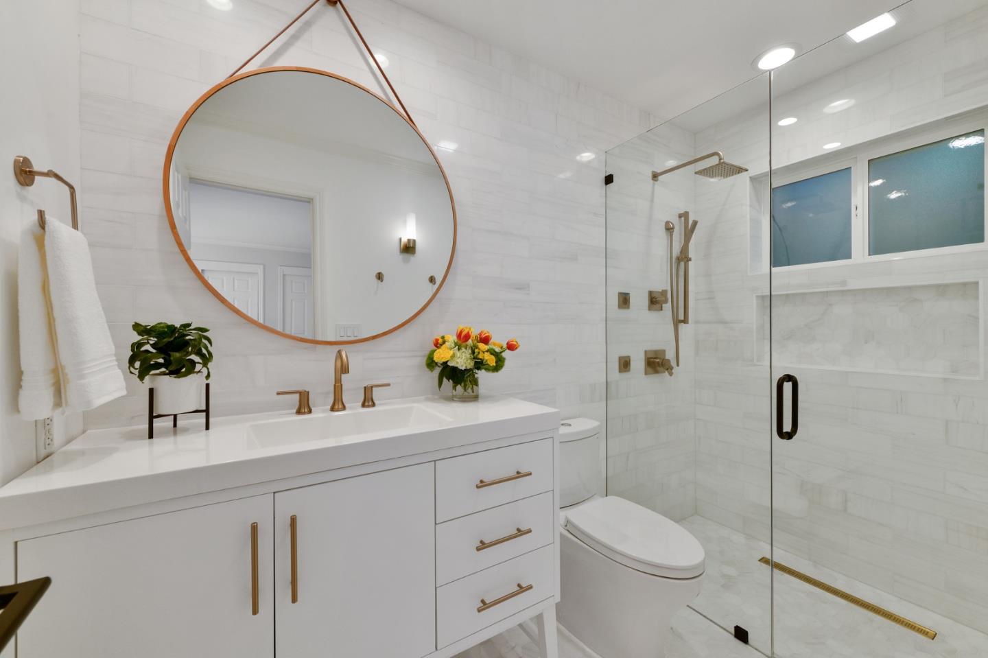 751 Partridge Avenue Menlo Park, CA 94025 - Photo 20 of 37 a bathroom with a toilet a sink and mirror