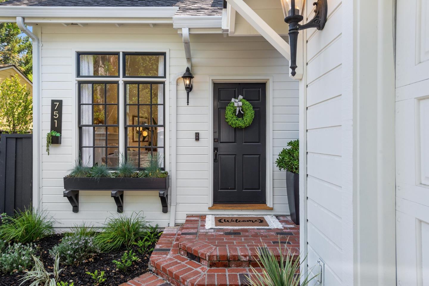 751 Partridge Avenue Menlo Park, CA 94025 - Photo 3 of 37 a front view of a house with porch