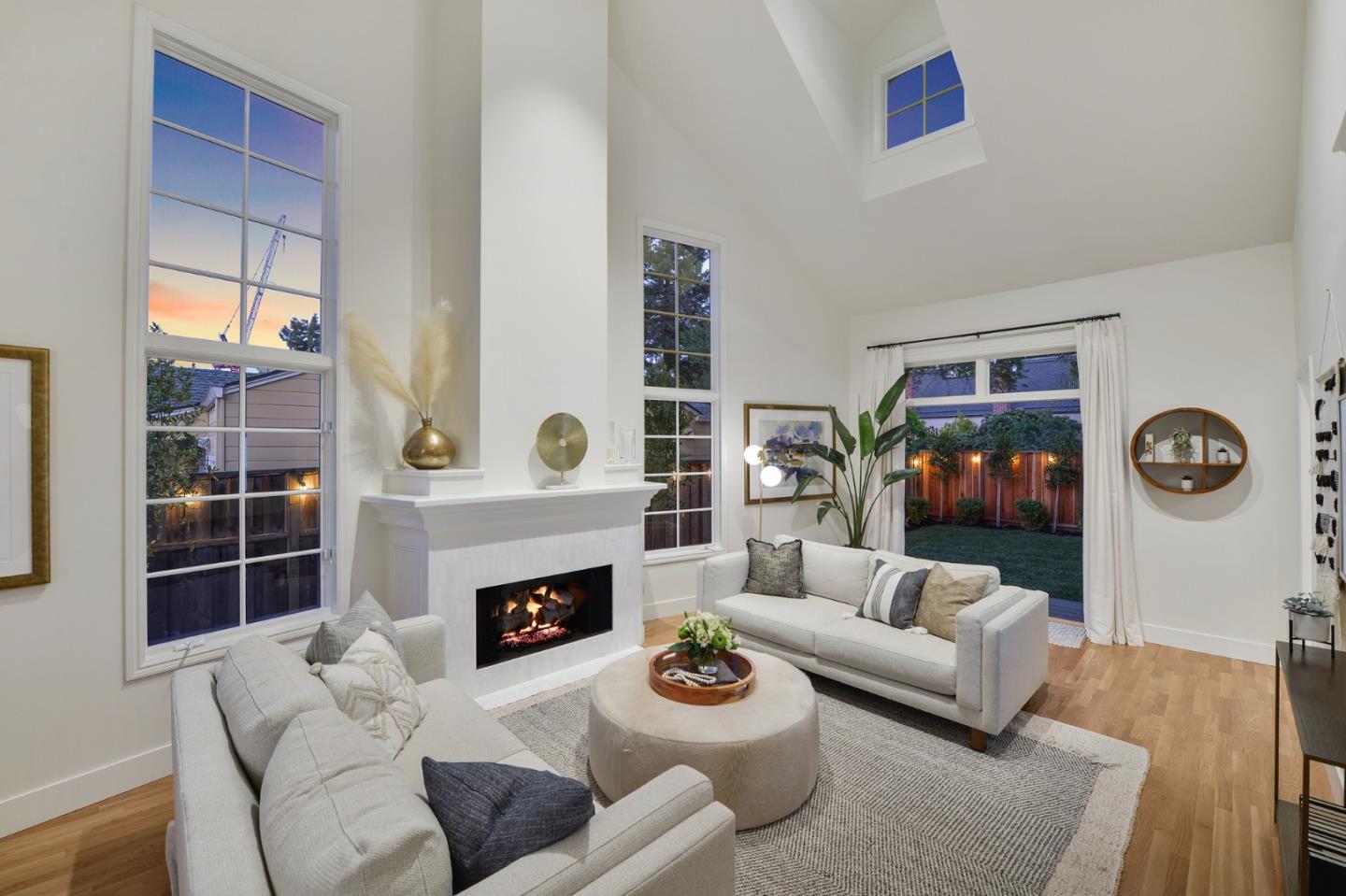 751 Partridge Avenue Menlo Park, CA 94025 - Photo 6 of 37 a living room with furniture a fireplace and a table