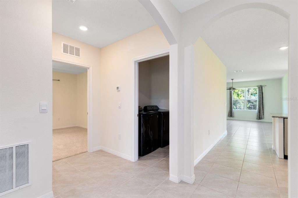 2520 Harmonia Hammock Road Harmony, FL 34773 - Photo 11 of 26 wooden floor in a hall with an entryway