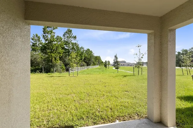 a view of a golf course with a lake