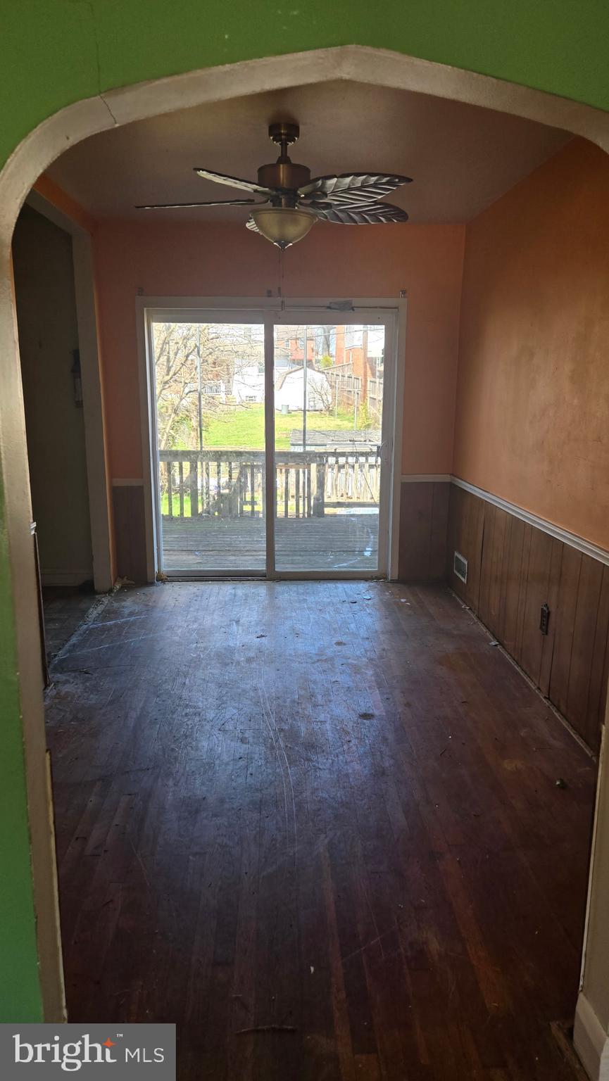 3706 Springwood Avenue Baltimore, MD 21206 - Photo 4 of 12 a view of an empty room with a window
