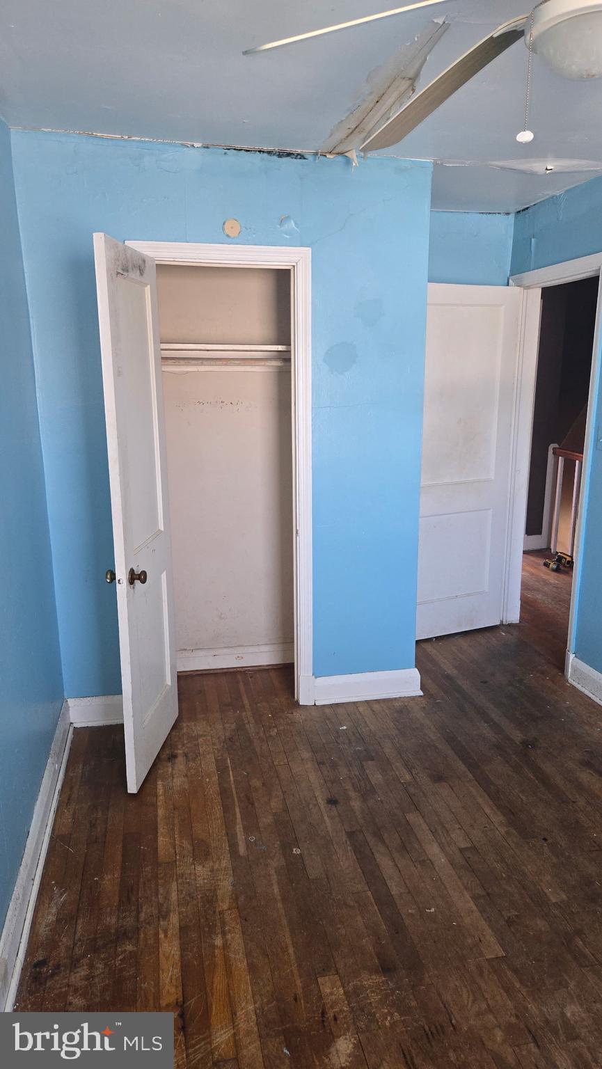 3706 Springwood Avenue Baltimore, MD 21206 - Photo 10 of 12 a view of empty room with wooden floor