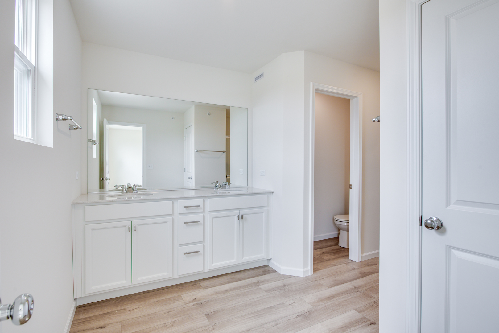 2247 Horseshoe Circle Plainfield, IL 60585 - Photo 14 of 20 a bathroom with a granite countertop sink and a mirror