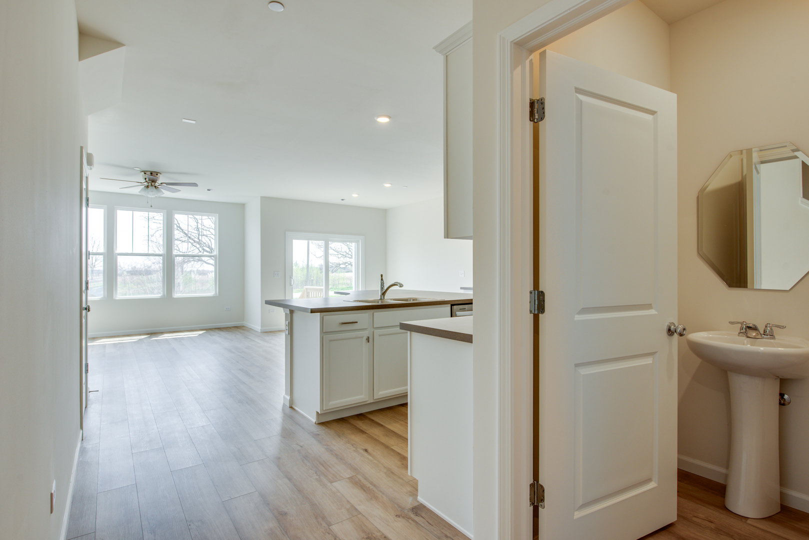 2247 Horseshoe Circle Plainfield, IL 60585 - Photo 2 of 20 a view of a kitchen cabinets and wooden floor
