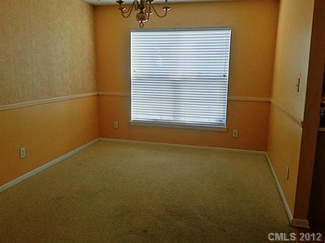 10546 Gold Pan Road Charlotte, NC 28215 - Photo 6 of 16 a view of a room that has a window in it