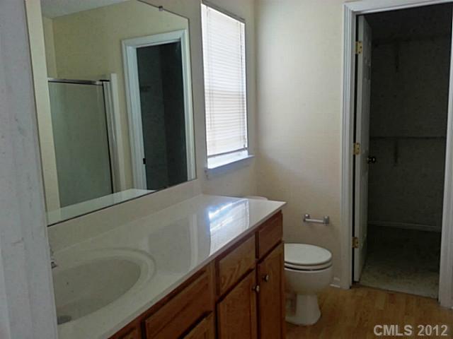 10546 Gold Pan Road Charlotte, NC 28215 - Photo 8 of 16 a bathroom with a toilet