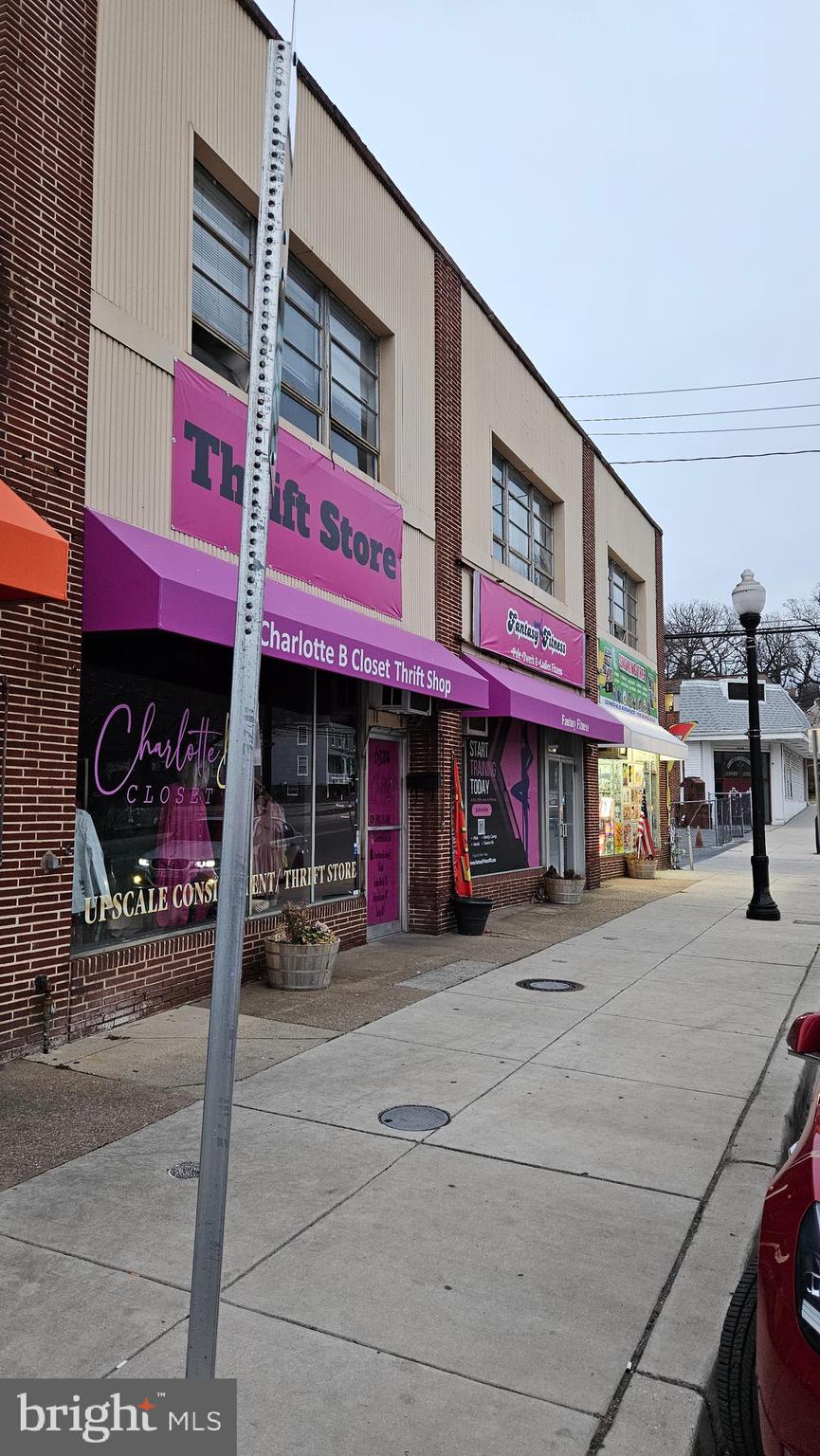 6330 Windsor Mill Road Gwynn Oak, MD 21207 - Photo 19 of 20 a front view of a building with street