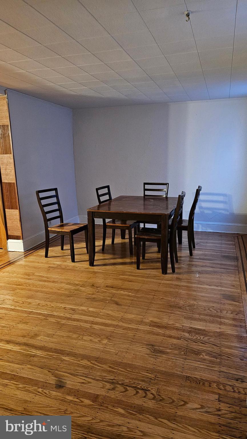 6330 Windsor Mill Road Gwynn Oak, MD 21207 - Photo 6 of 20 a view of chairs and table in a room