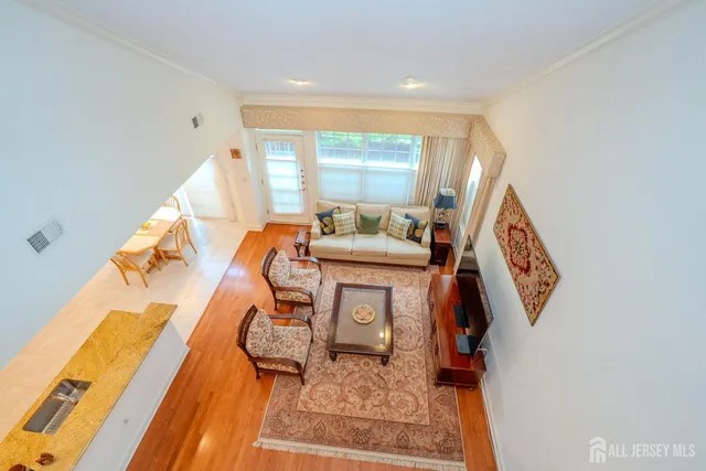 view of living room with furniture and a window