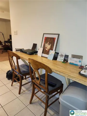 a kitchen with a sink appliances and cabinets