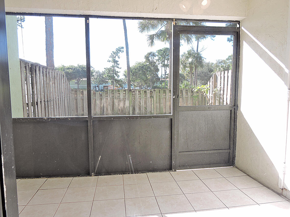 5040 Society Place East, Unit E West Palm Beach, FL 33415 - Photo 11 of 26 a bathroom with a shower