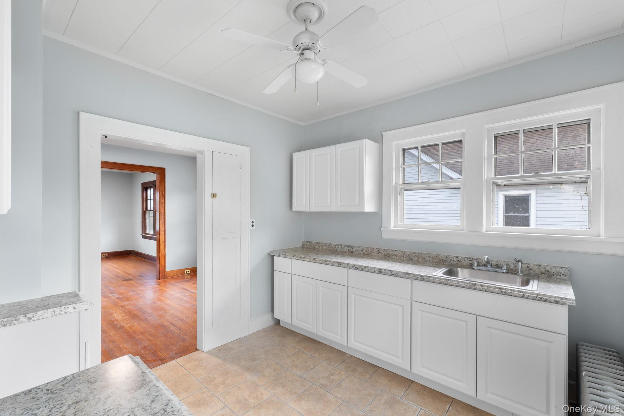 16 Oak Terrace Suffern, NY 10901 - Photo 12 of 26 a bathroom with a granite countertop sink and mirror