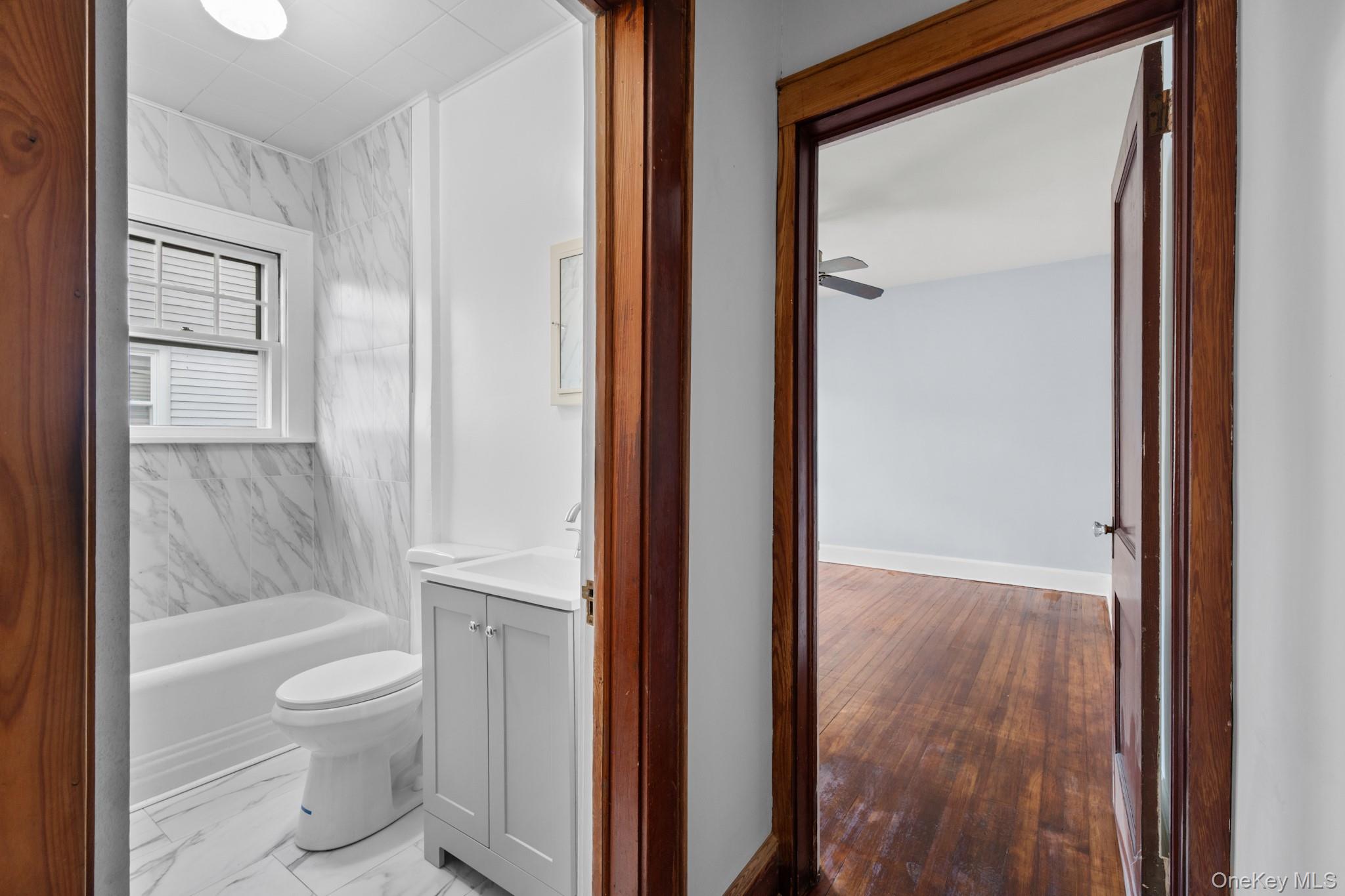 16 Oak Terrace Suffern, NY 10901 - Photo 15 of 26 a bathroom with a toilet tub and a shower