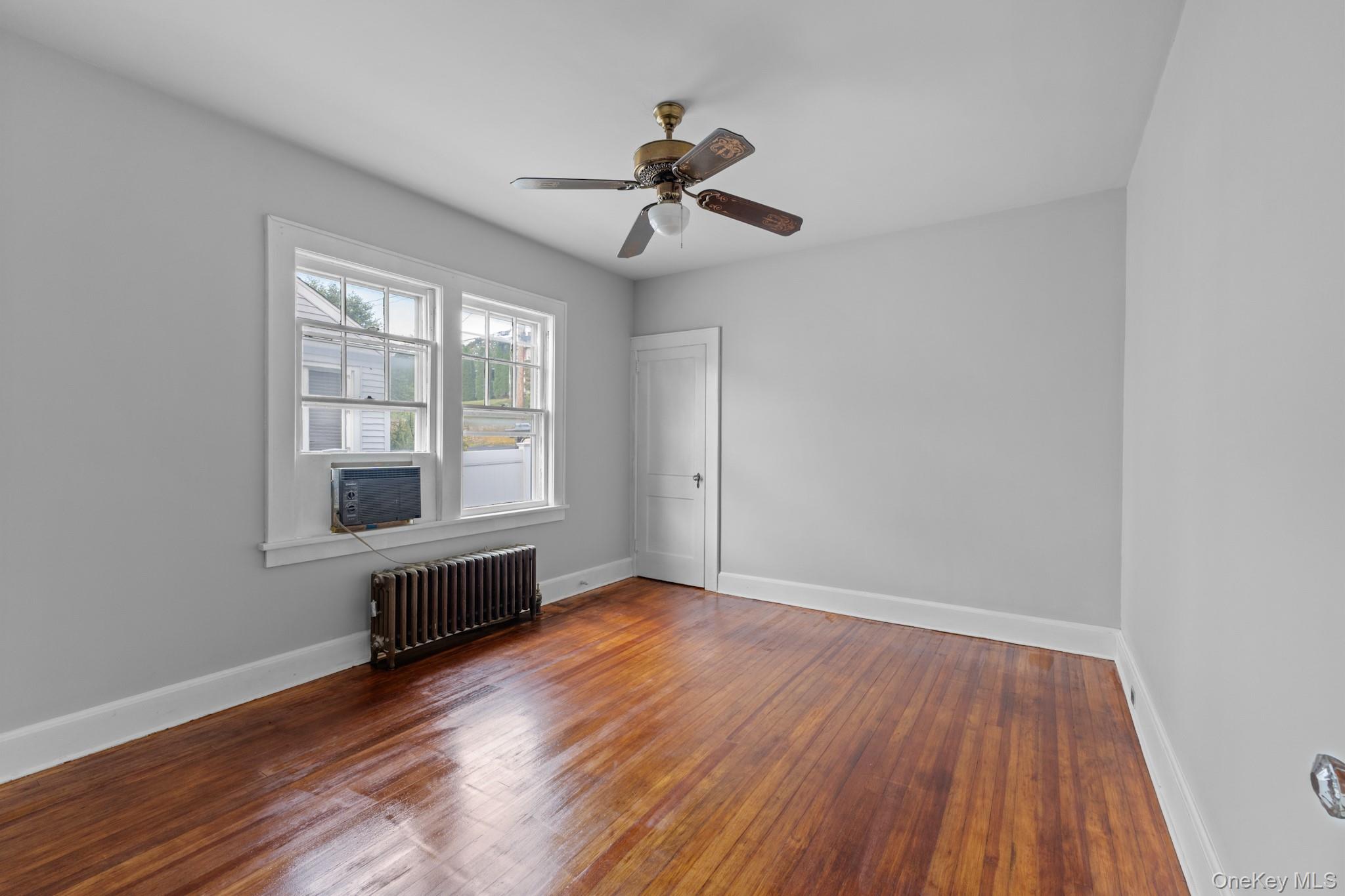16 Oak Terrace Suffern, NY 10901 - Photo 18 of 26 wooden floor in an empty room with a window