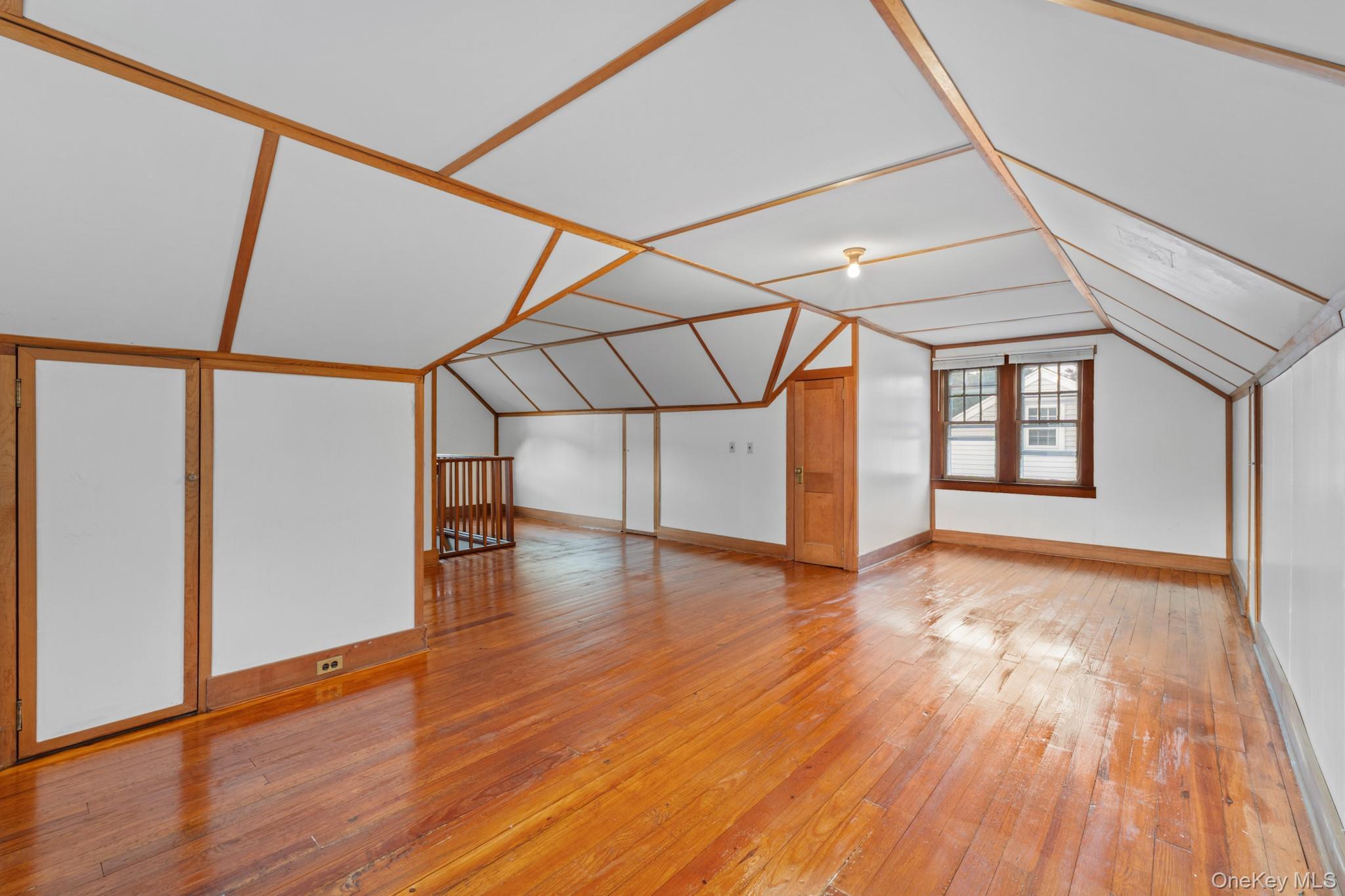 16 Oak Terrace Suffern, NY 10901 - Photo 20 of 26 a view of an empty room with wooden floor and windows