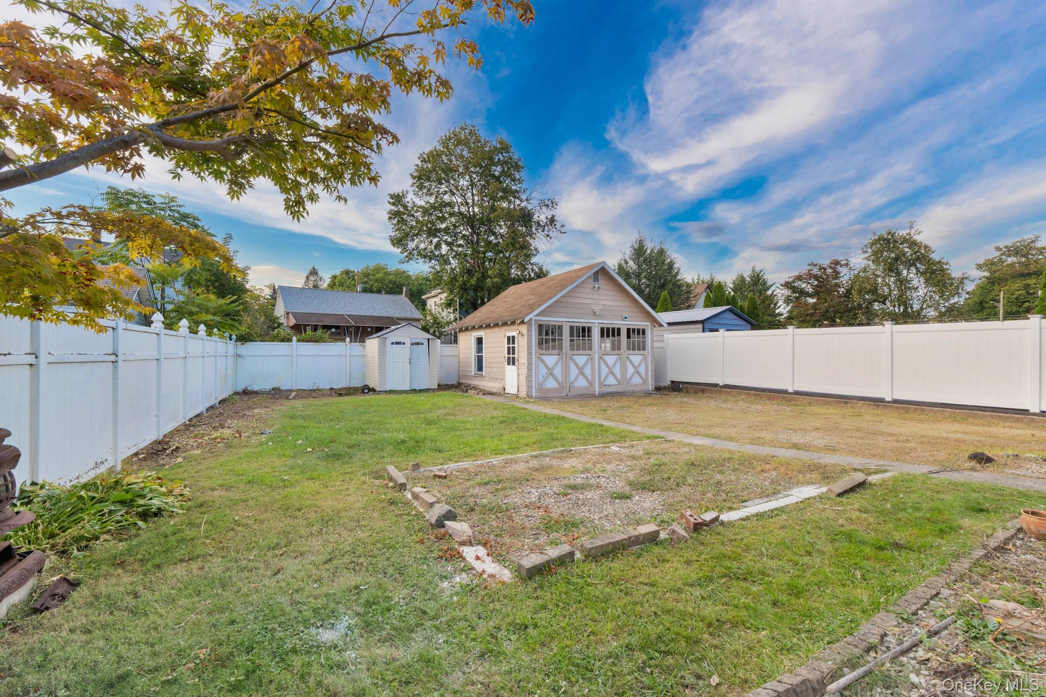 16 Oak Terrace Suffern, NY 10901 - Photo 26 of 26 a swimming pool with wooden fence