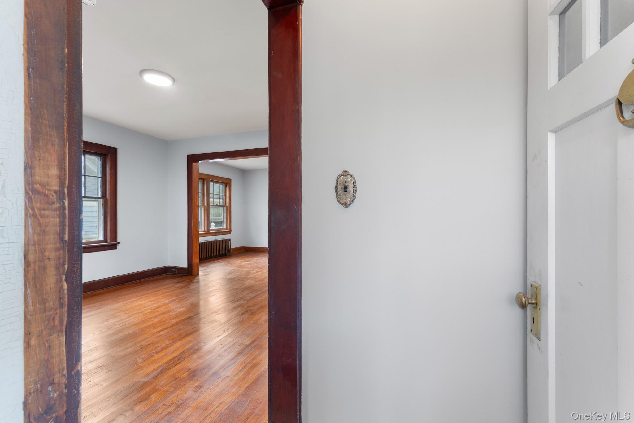 16 Oak Terrace Suffern, NY 10901 - Photo 5 of 26 a view of a hallway with wooden floor and windows