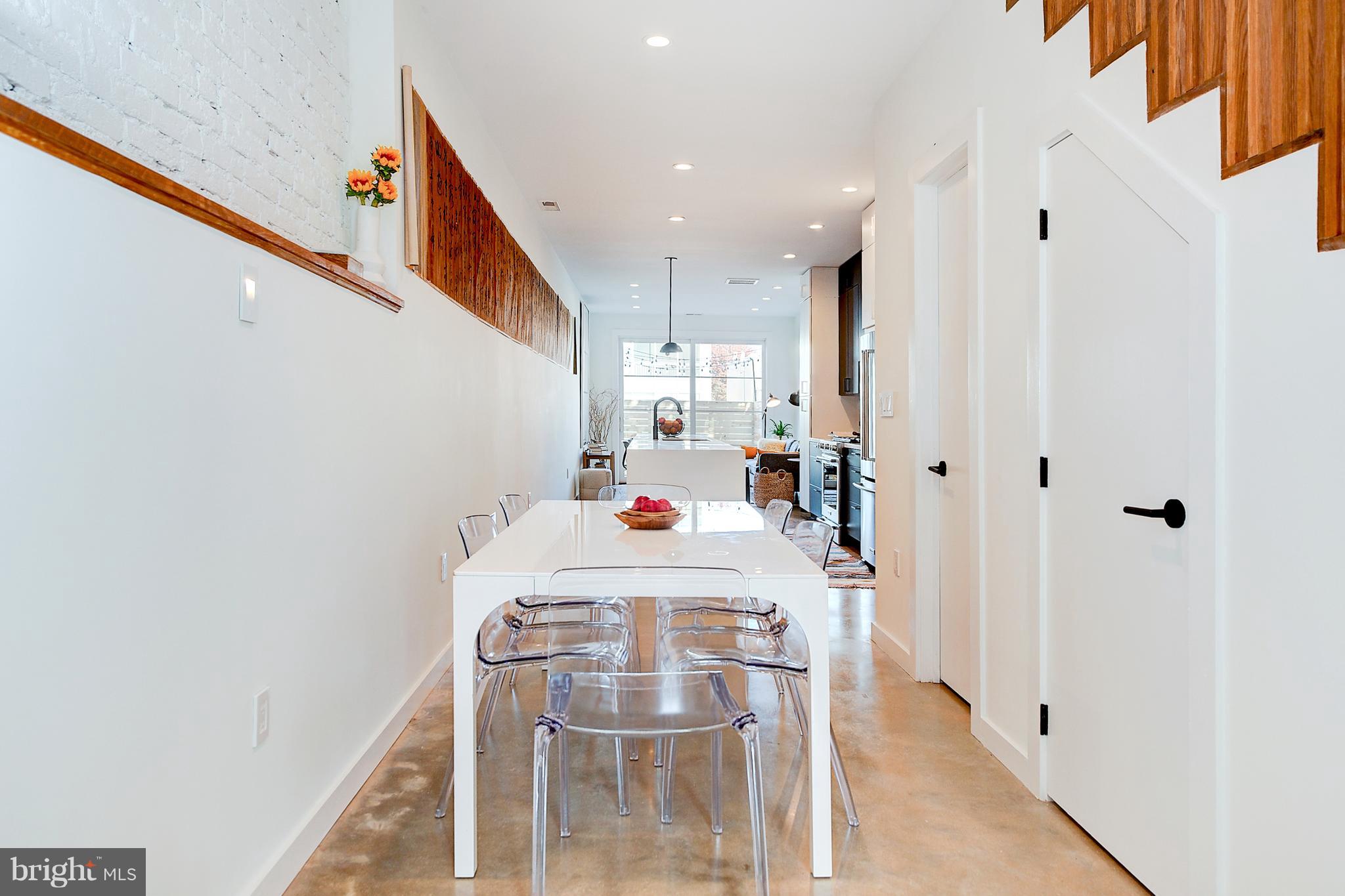 443 Ridge Street Northwest Washington, DC 20001 - Photo 10 of 47 a very nice looking room with a white walls