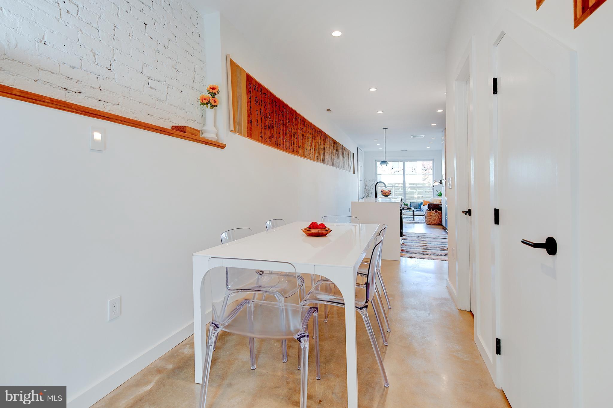 443 Ridge Street Northwest Washington, DC 20001 - Photo 11 of 47 a room with furniture and wooden floor