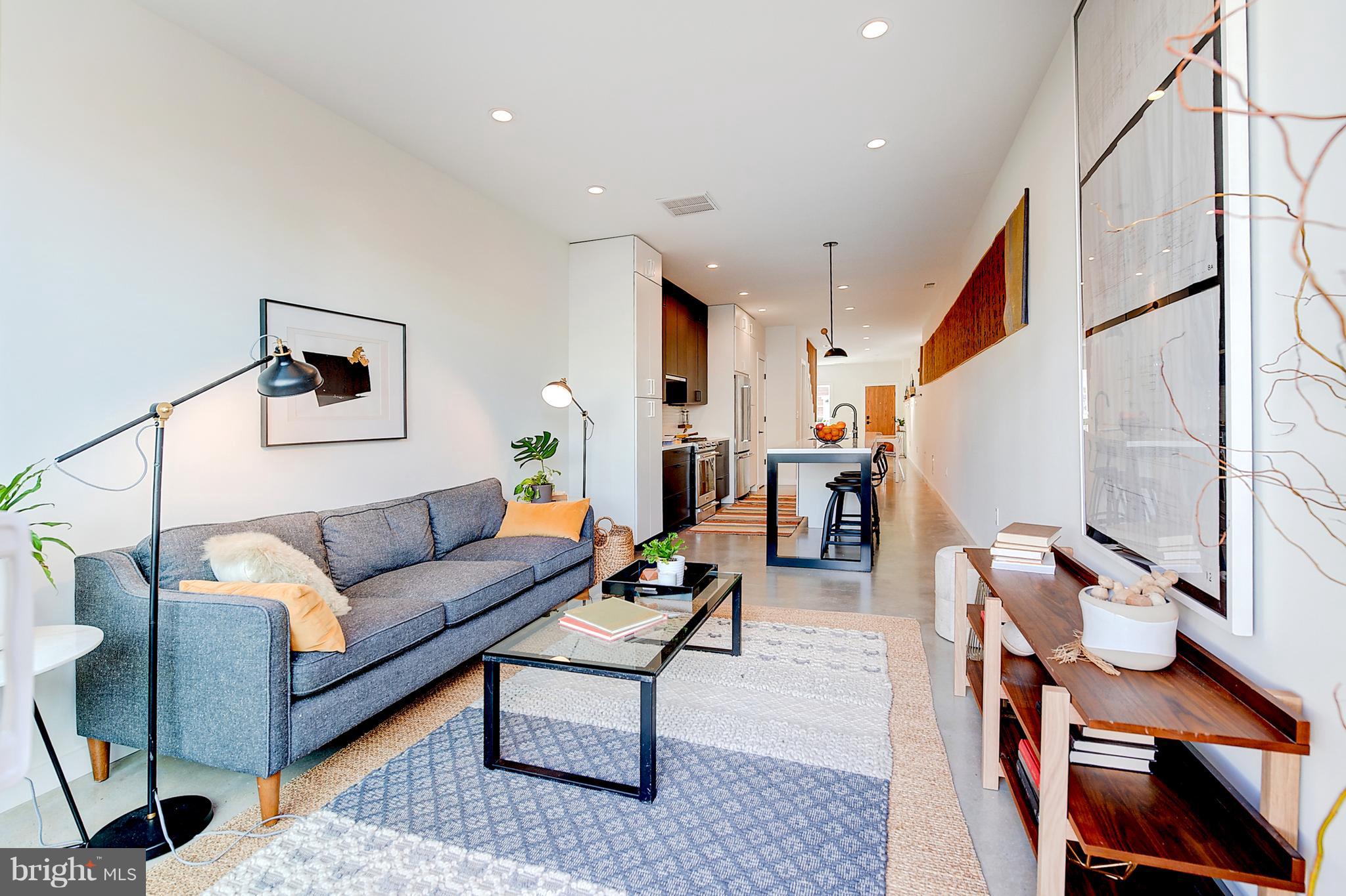 443 Ridge Street Northwest Washington, DC 20001 - Photo 3 of 47 a living room with furniture and wooden floor