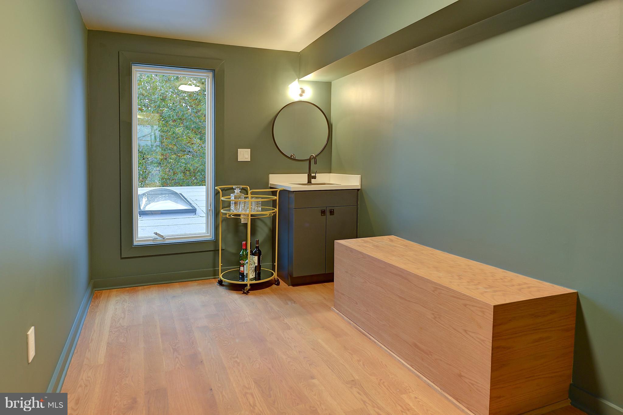 443 Ridge Street Northwest Washington, DC 20001 - Photo 39 of 47 a view of a room with mirror and window