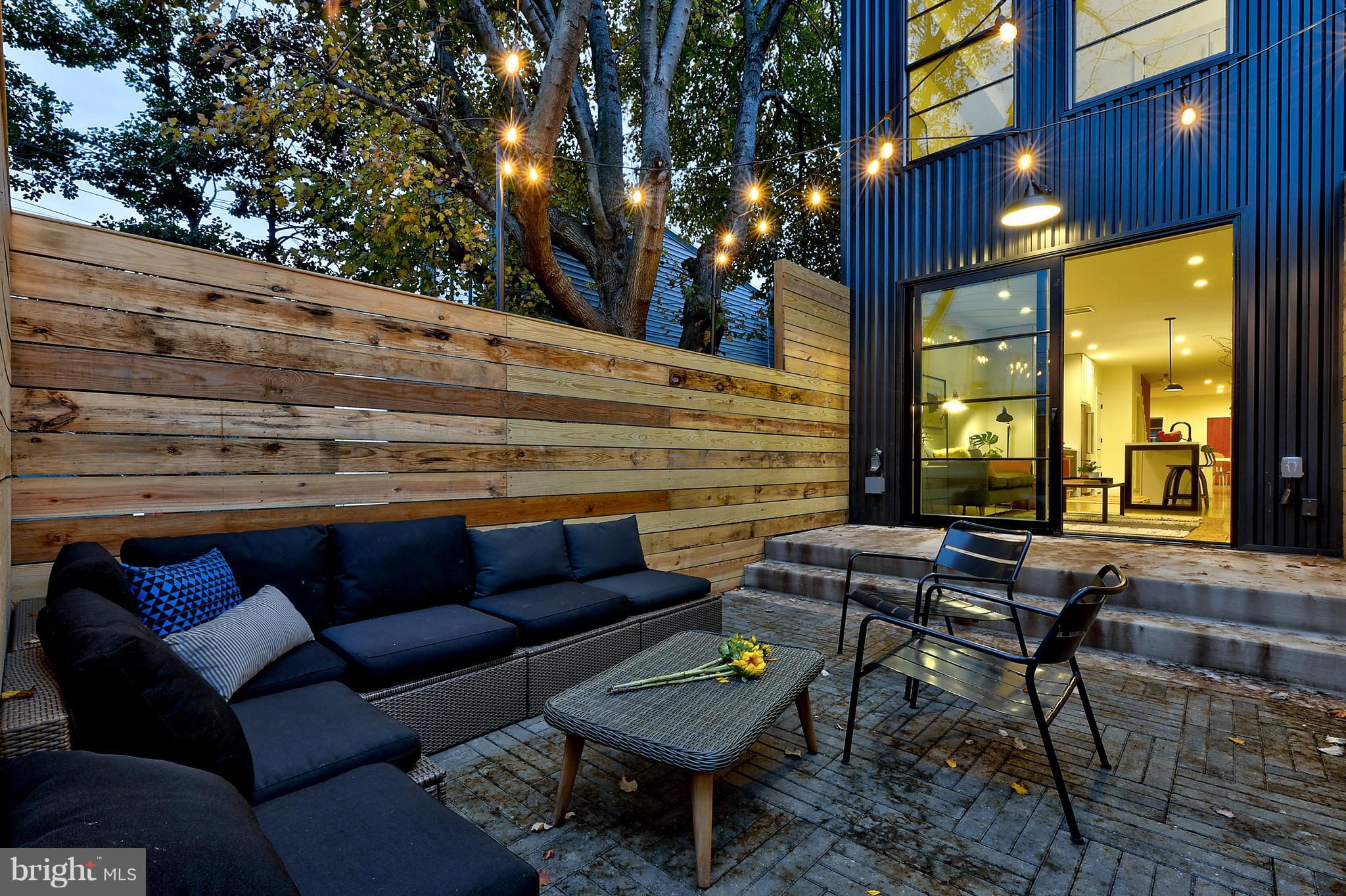 443 Ridge Street Northwest Washington, DC 20001 - Photo 41 of 47 a outdoor living space with patio furniture and wooden floor