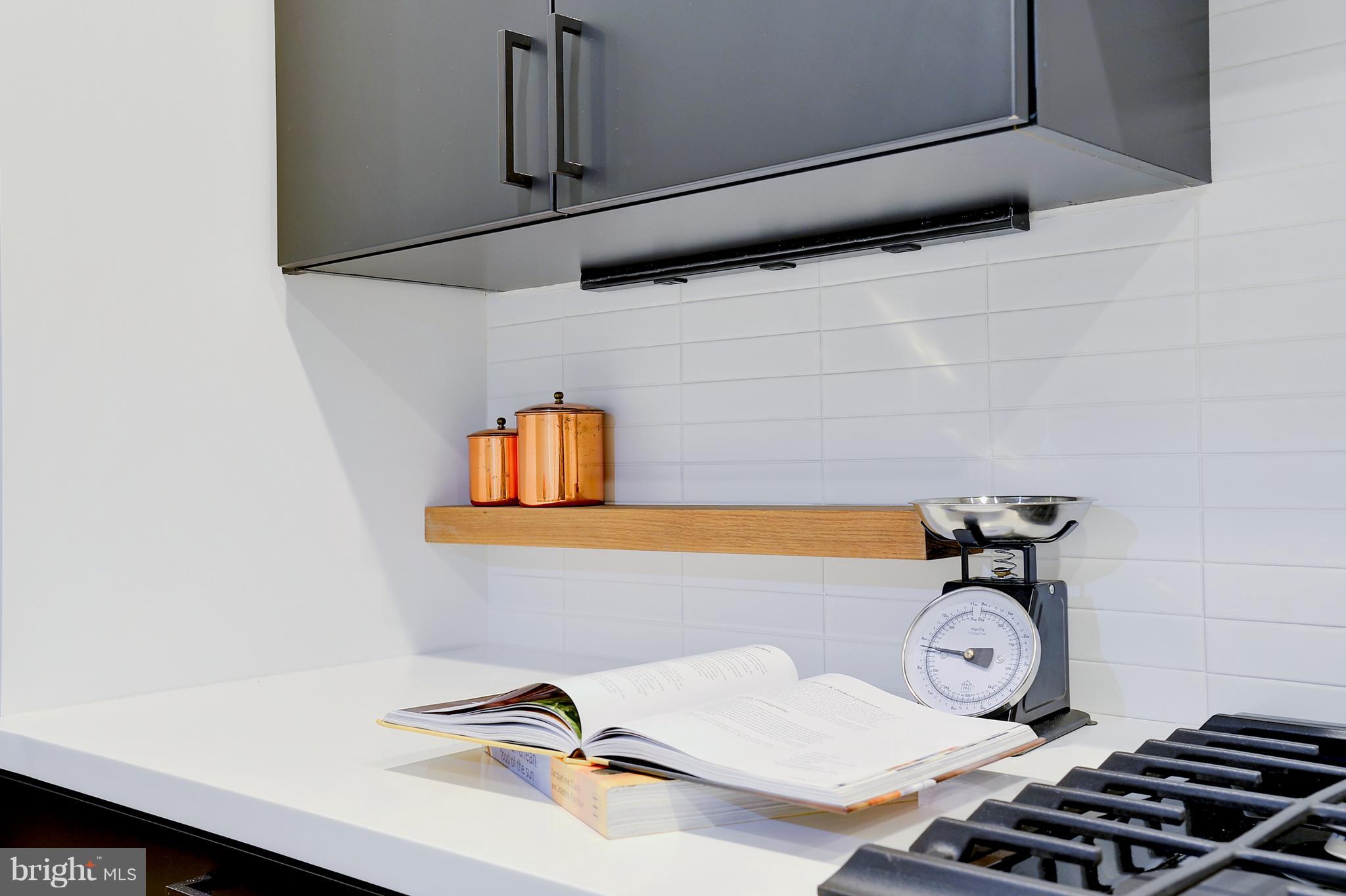 443 Ridge Street Northwest Washington, DC 20001 - Photo 44 of 47 a bathroom with a sink and a mirror