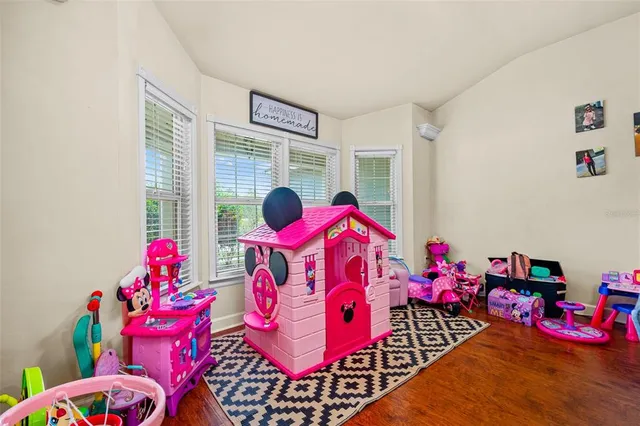 a bedroom with furniture and a couch