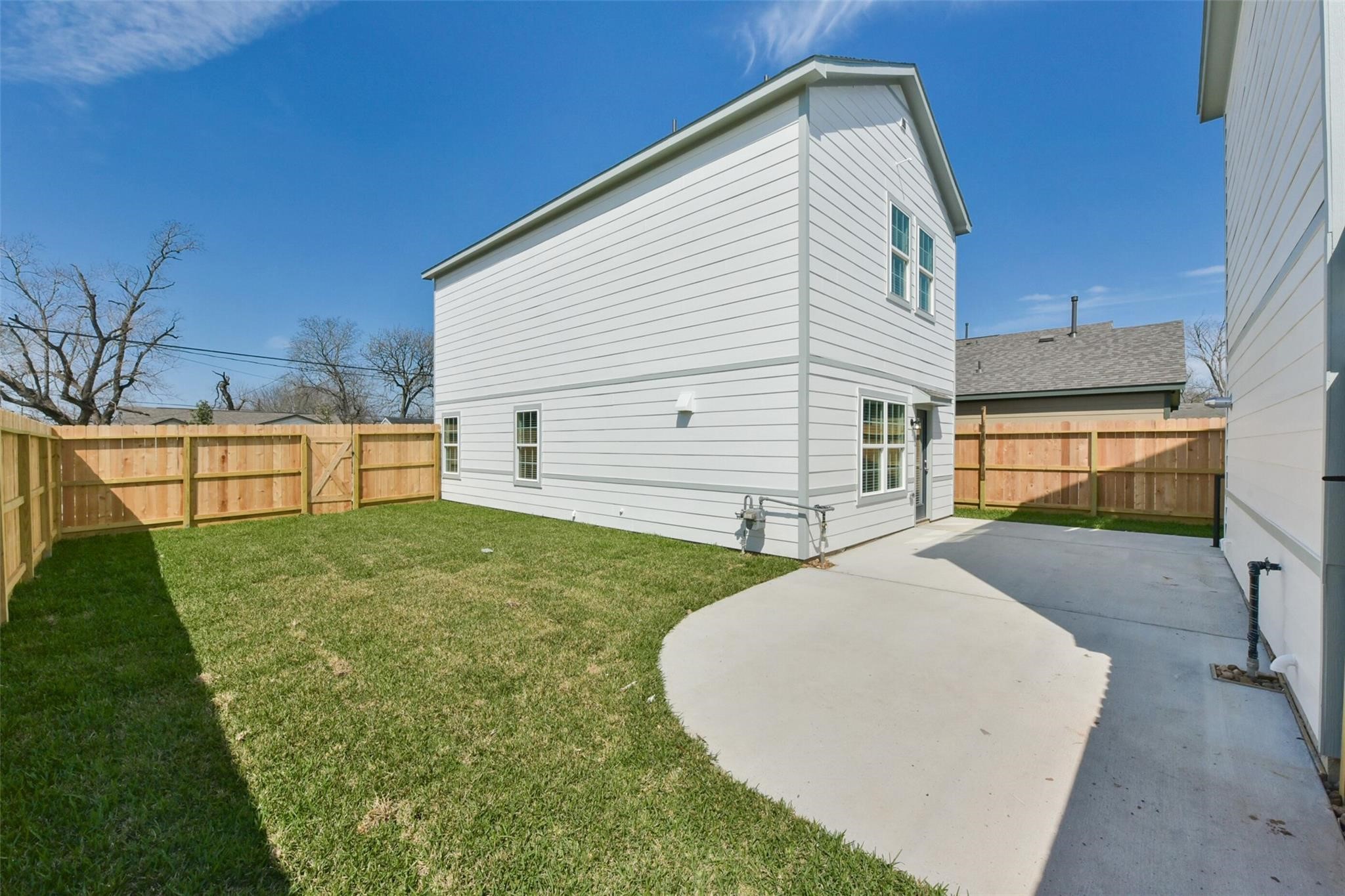 6835 New York Street Houston, TX 77021 - Photo 12 of 12 a view of backyard of house with wooden fence