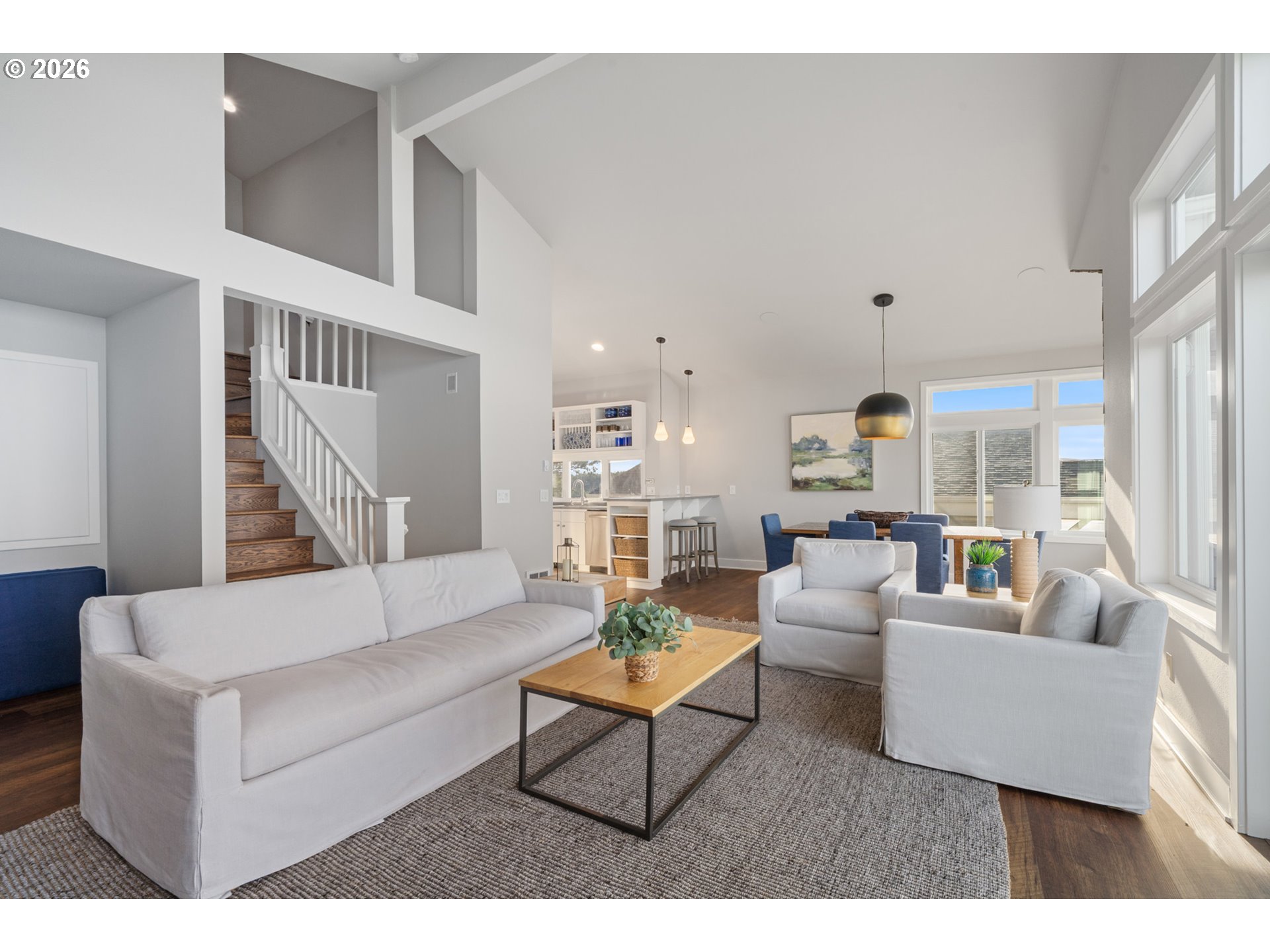 355 Promontory Lane Oceanside, OR 97141 - Photo 15 of 48 a living room with furniture and a large window