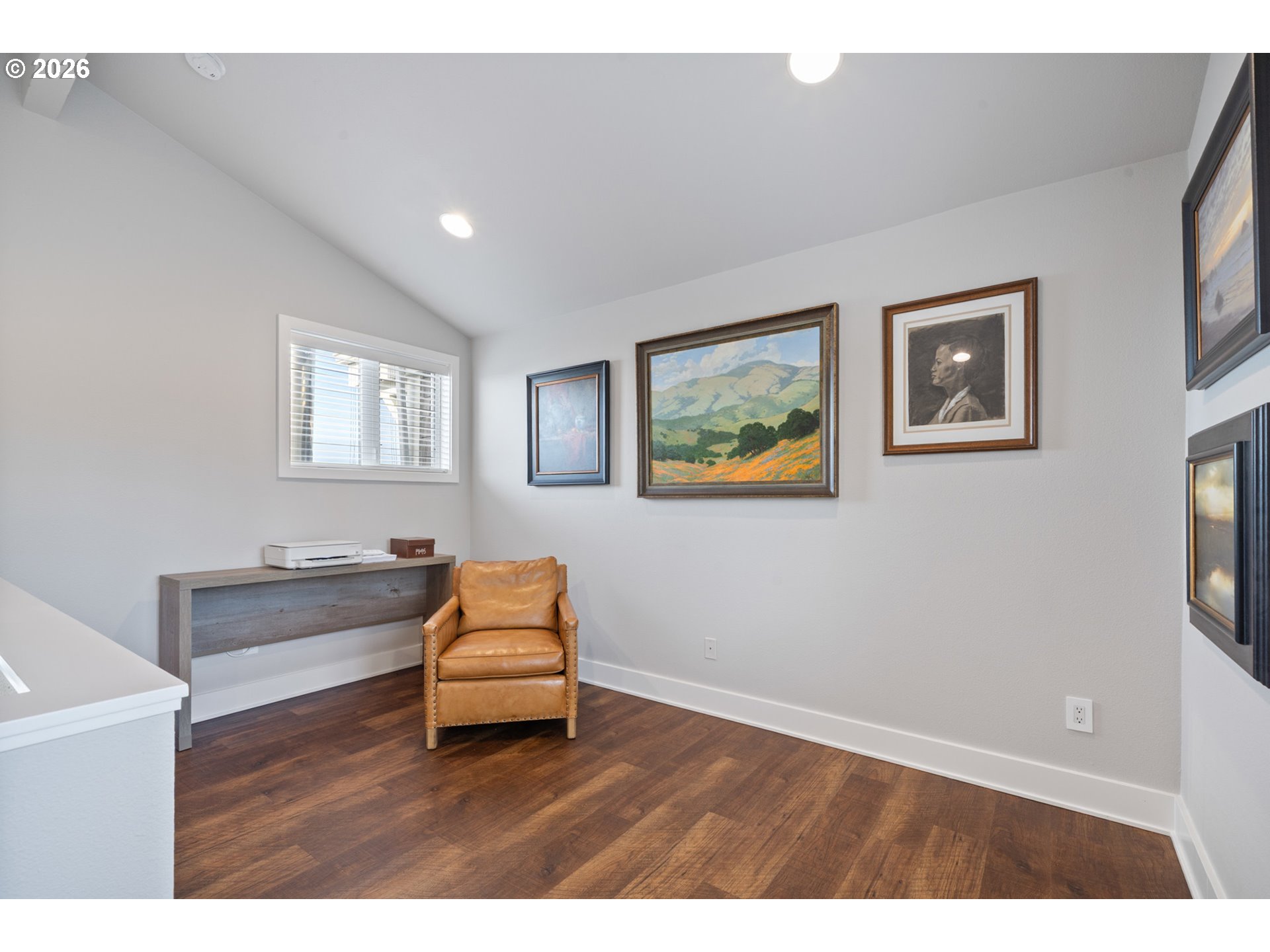 355 Promontory Lane Oceanside, OR 97141 - Photo 21 of 48 a room with painting and wooden floor