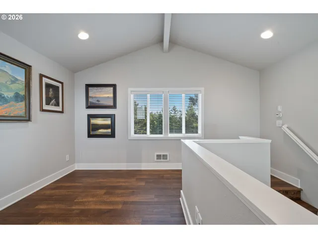 a bathroom with a bathtub and a sink