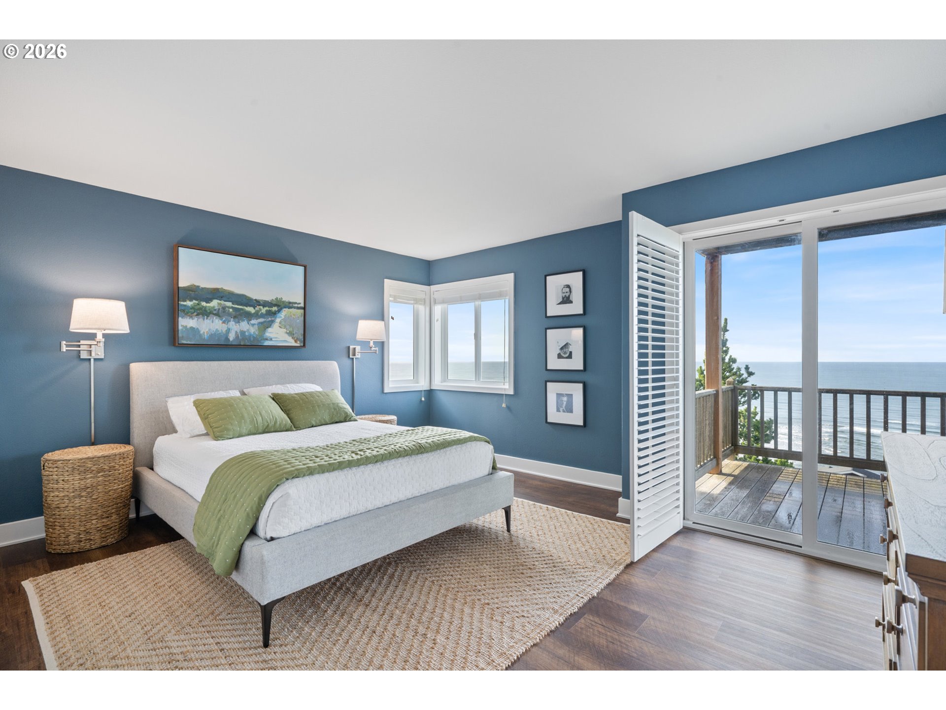 355 Promontory Lane Oceanside, OR 97141 - Photo 24 of 48 a bedroom with a large bed and a window