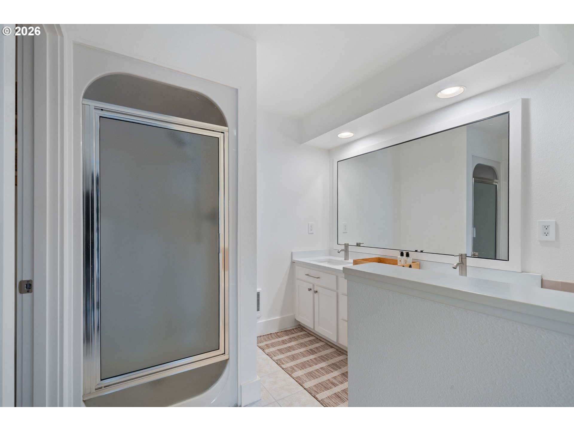 355 Promontory Lane Oceanside, OR 97141 - Photo 27 of 48 a bathroom with a sink a toilet and mirror