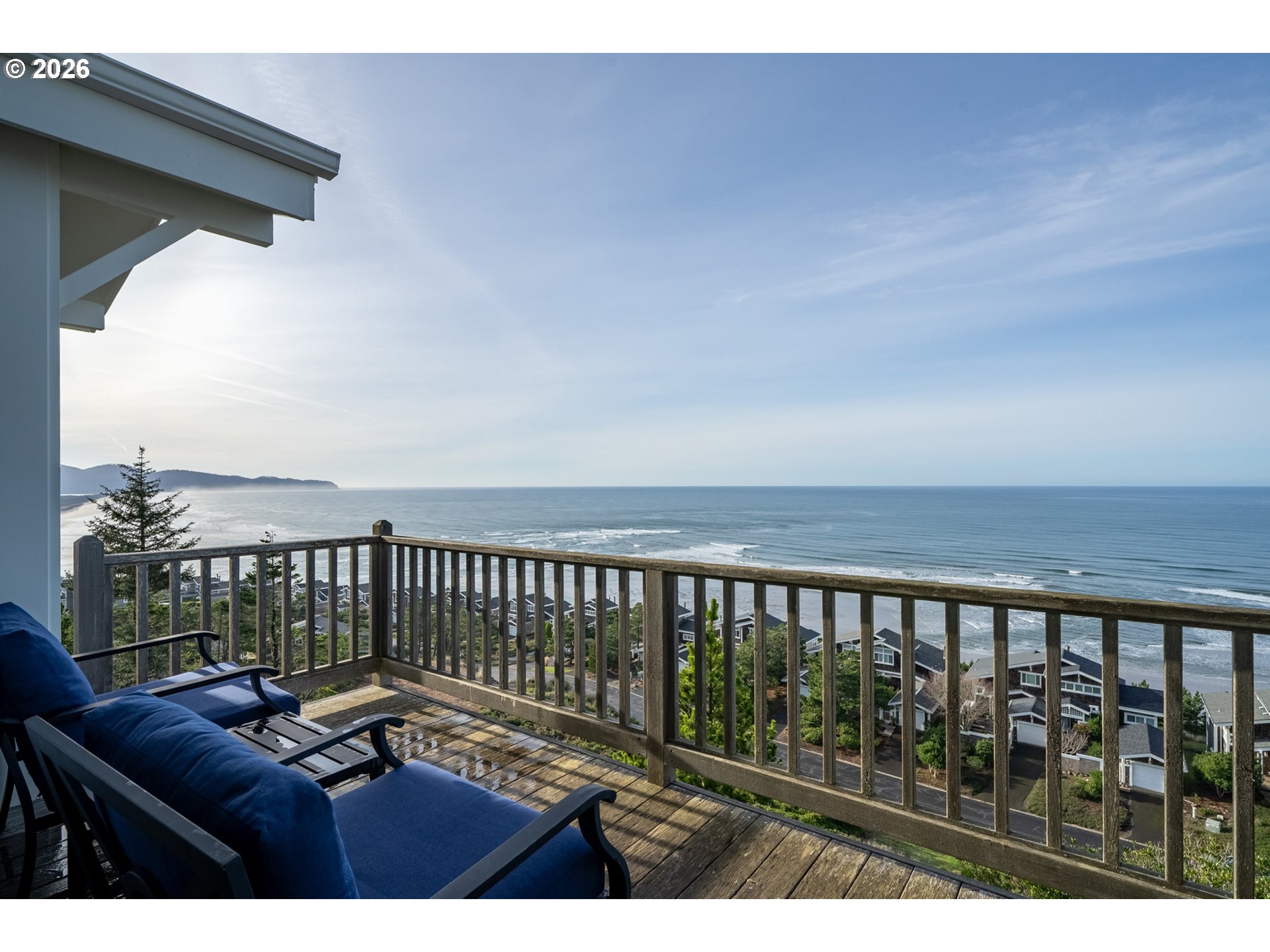 355 Promontory Lane Oceanside, OR 97141 - Photo 3 of 48 a view of a balcony with furniture
