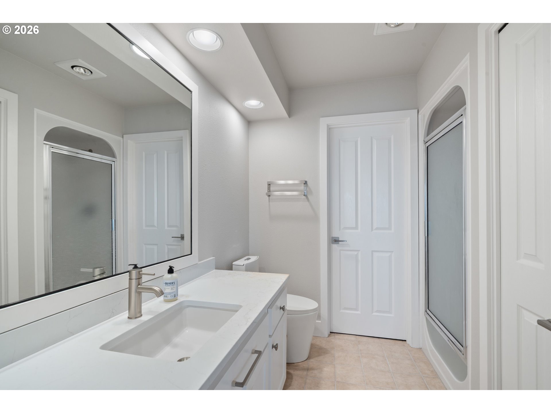 355 Promontory Lane Oceanside, OR 97141 - Photo 32 of 48 a bathroom with a sink and a mirror