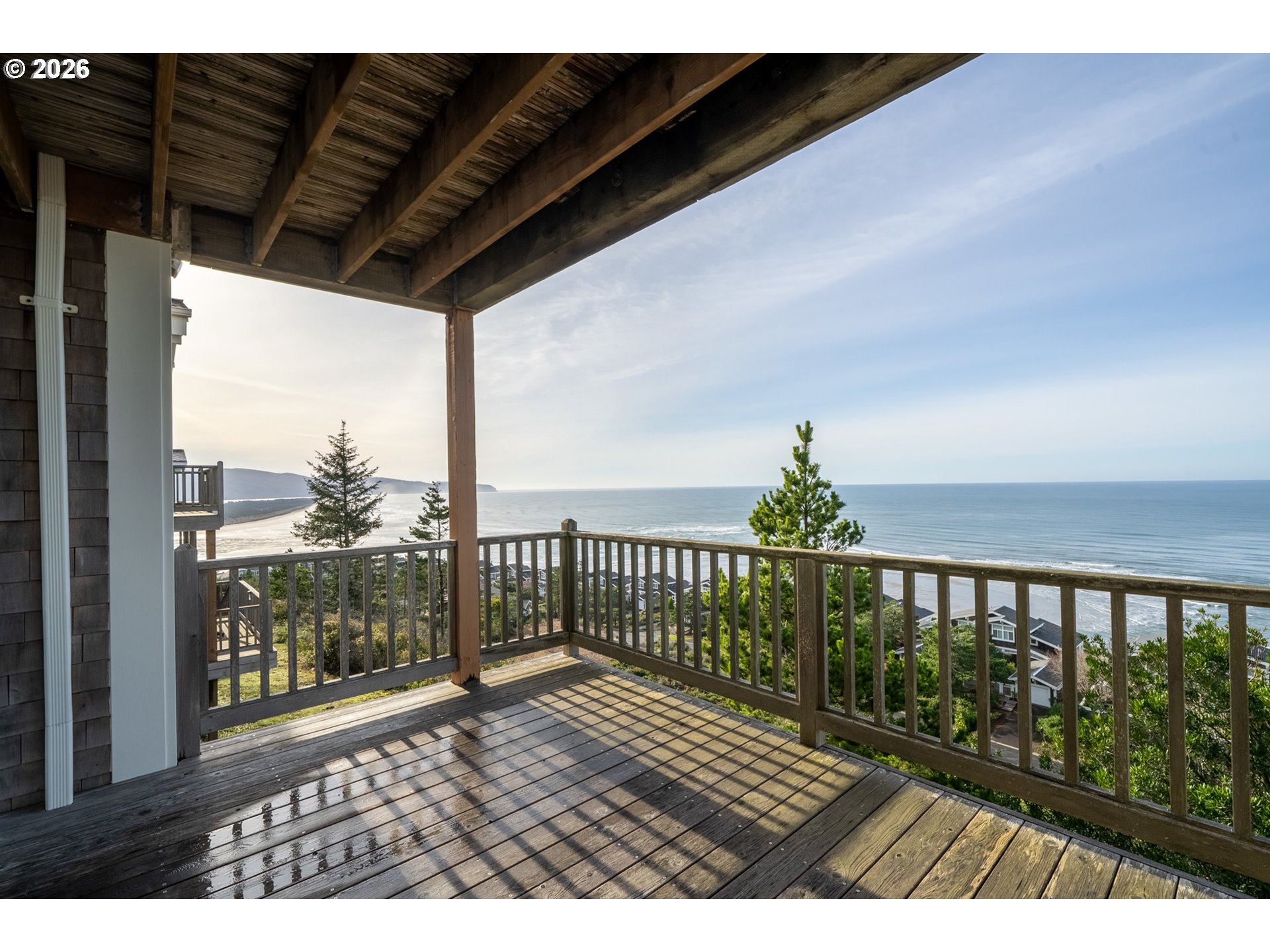 355 Promontory Lane Oceanside, OR 97141 - Photo 34 of 48 a view of balcony with wooden floor