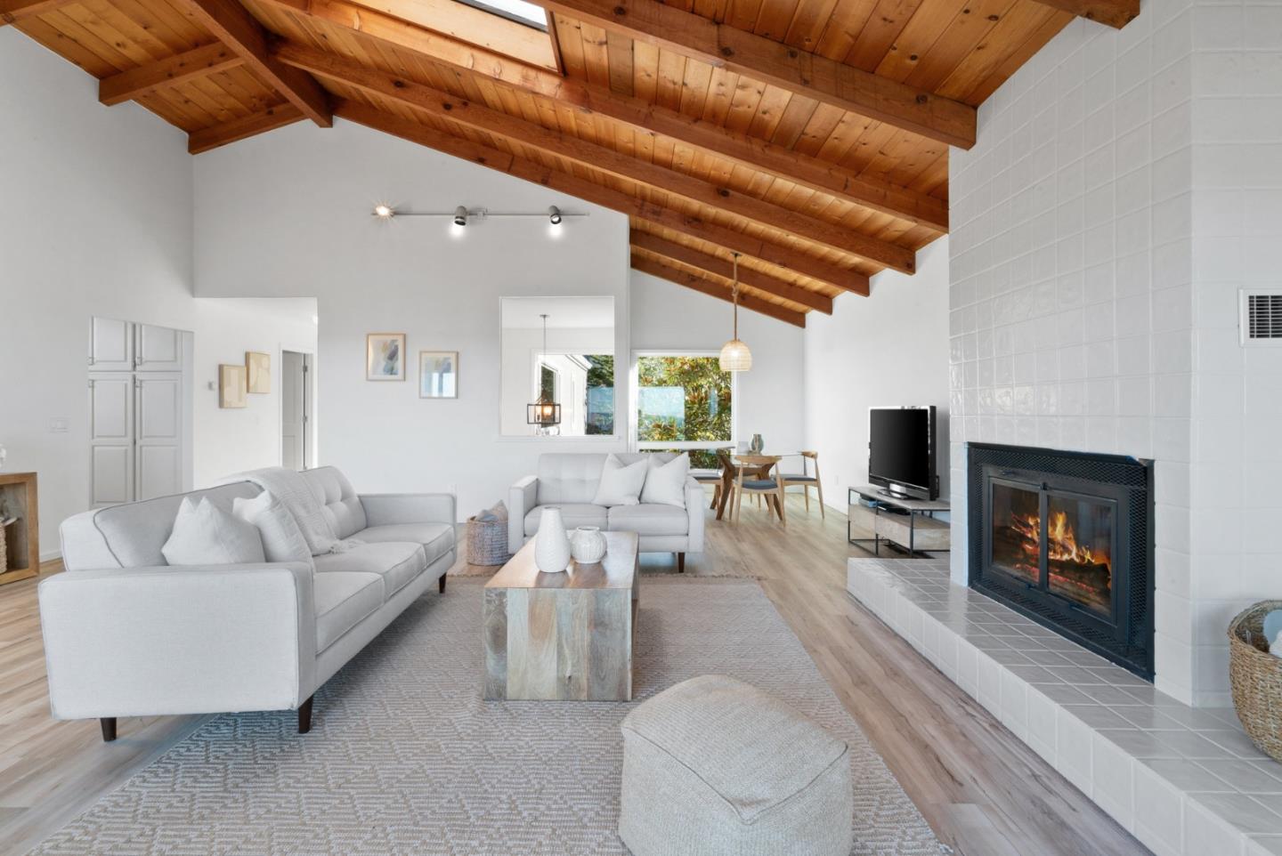 1102 Vía Tornasol Aptos, CA 95003 - Photo 11 of 67 a living room with furniture and a fireplace