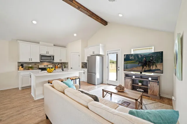 a view of a golf course with a lake