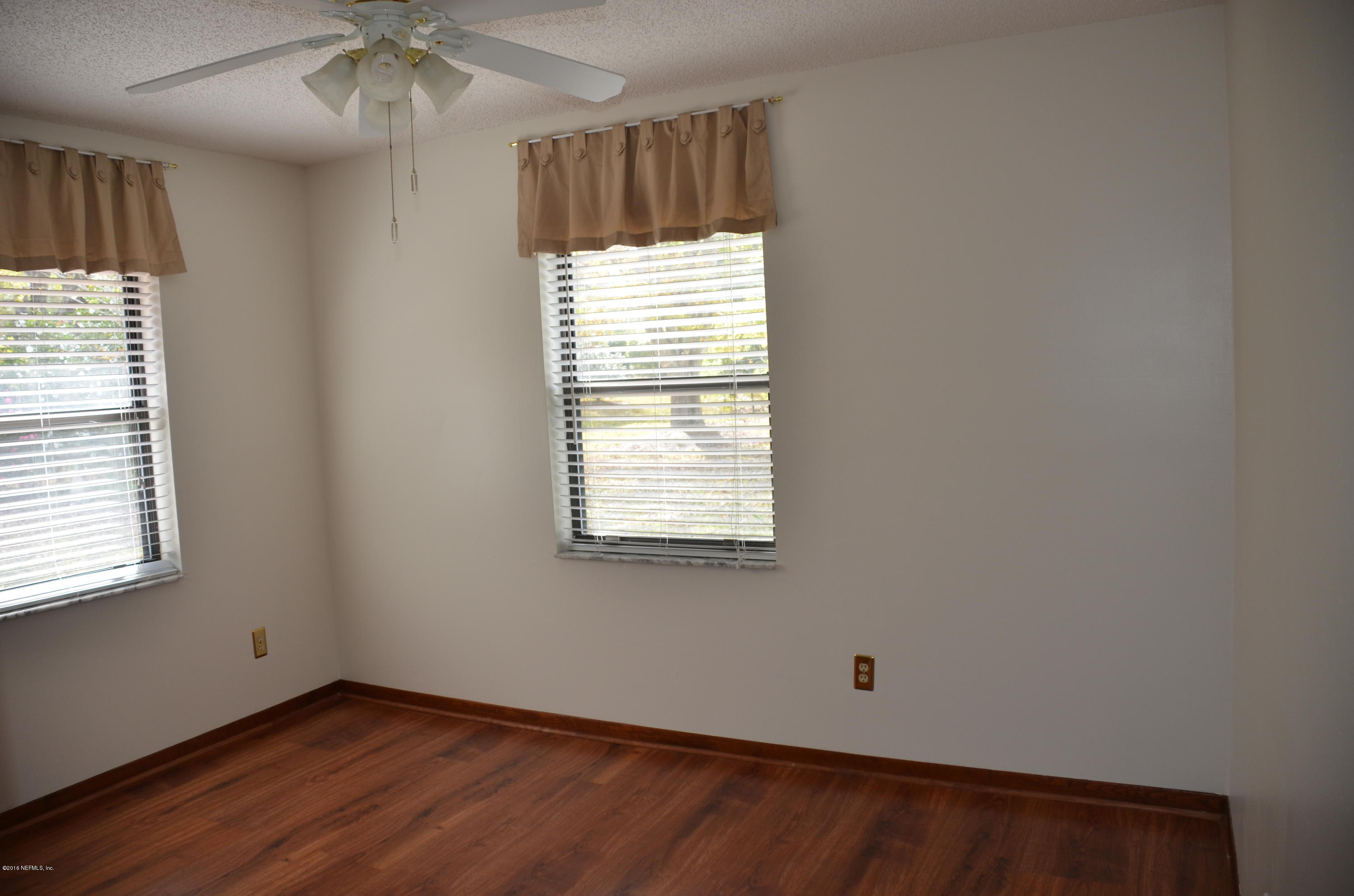 540516 Lem Turner Road Callahan, FL 32011 - Photo 20 of 26 an empty room with a window