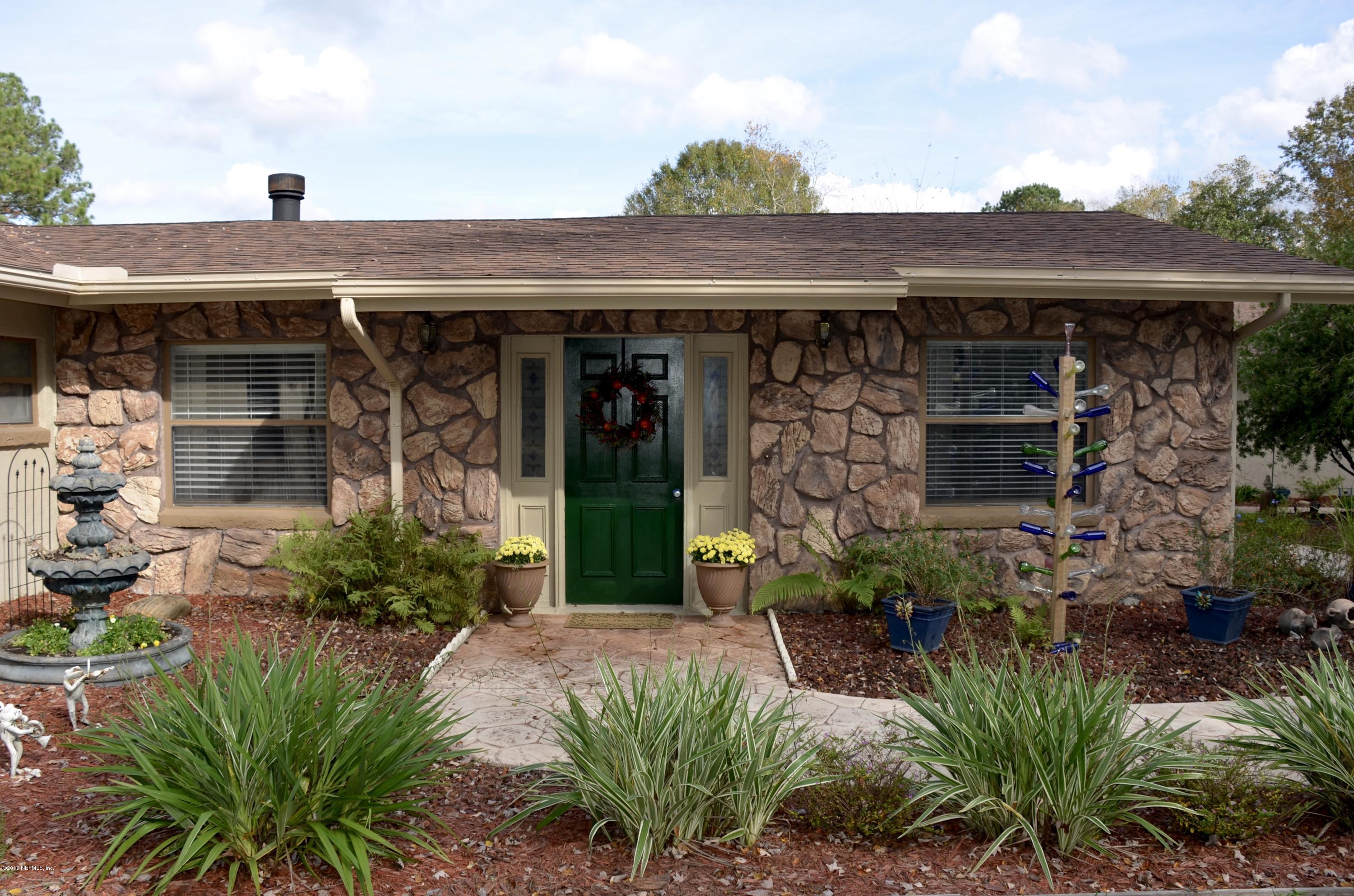 540516 Lem Turner Road Callahan, FL 32011 - Photo 2 of 26 a view of a entryway front of house