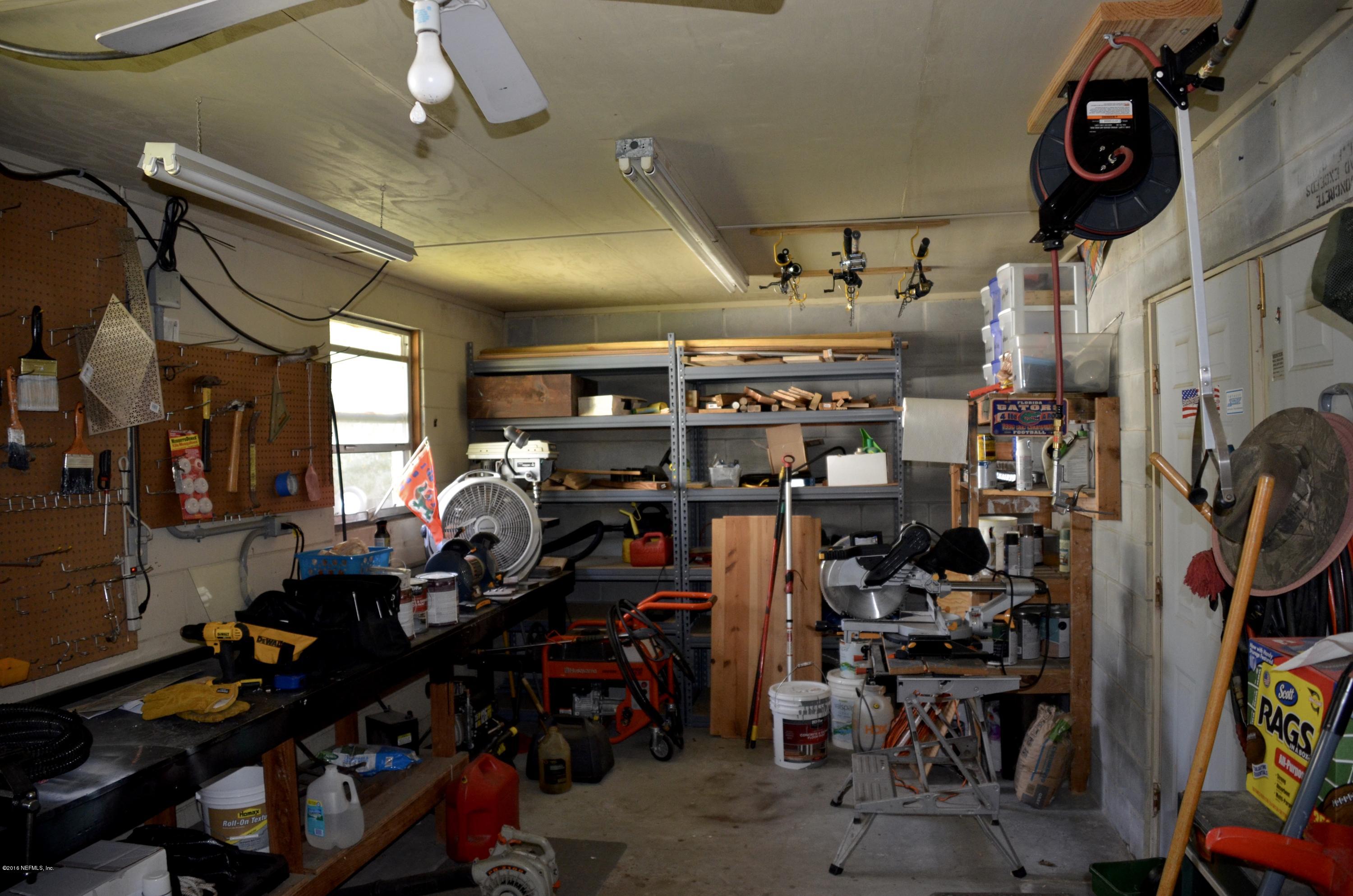 540516 Lem Turner Road Callahan, FL 32011 - Photo 23 of 26 a view of a room with gym equipment