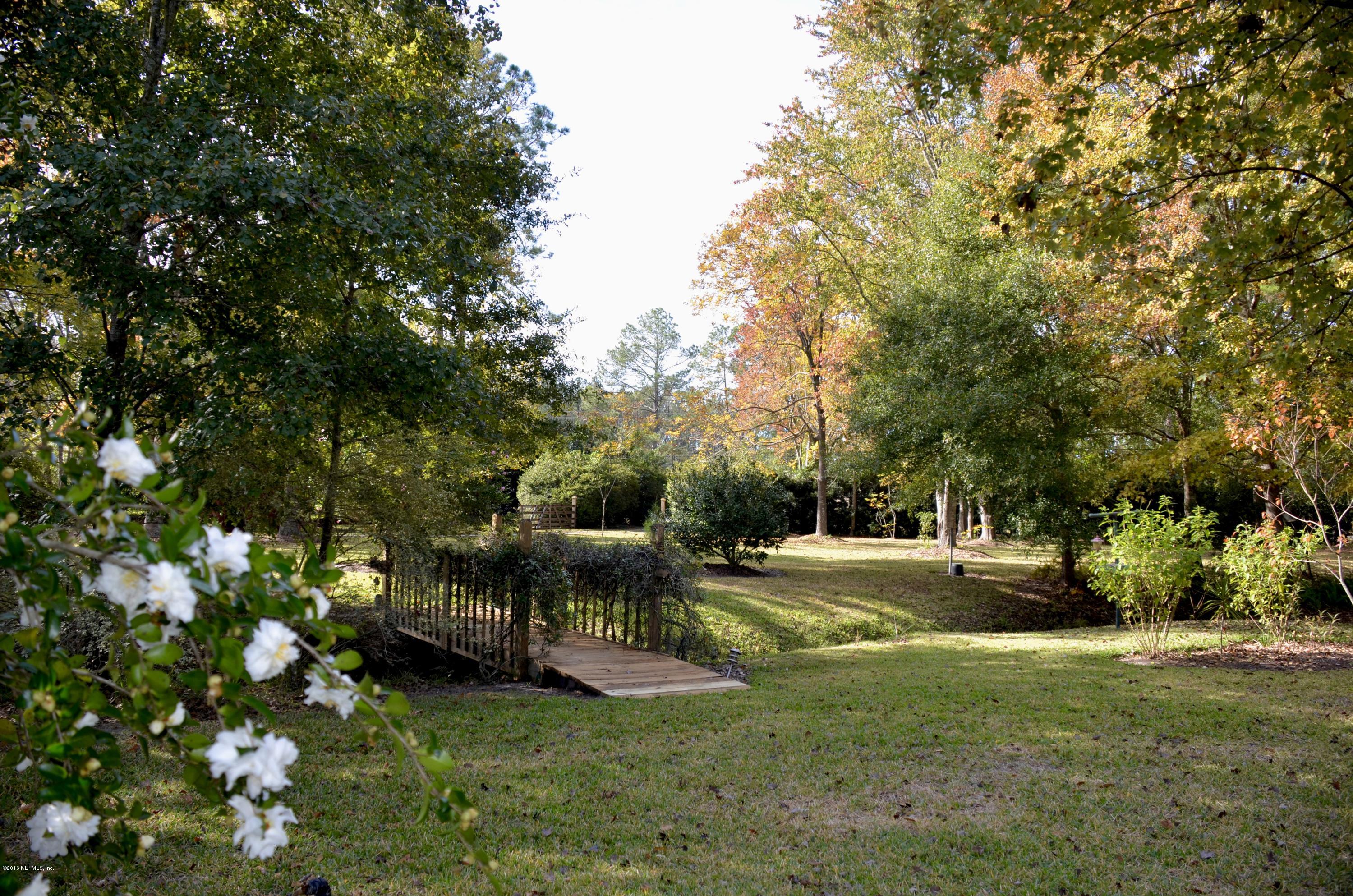 540516 Lem Turner Road Callahan, FL 32011 - Photo 25 of 26 a view of a park with large trees