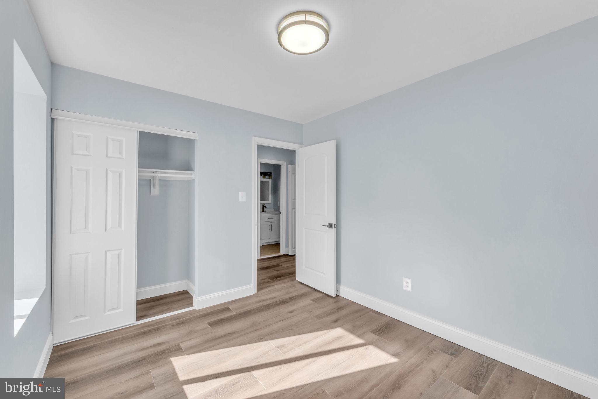 13314 Apgar Place Herndon, VA 20170 - Photo 21 of 39 an empty room with wooden floor and window