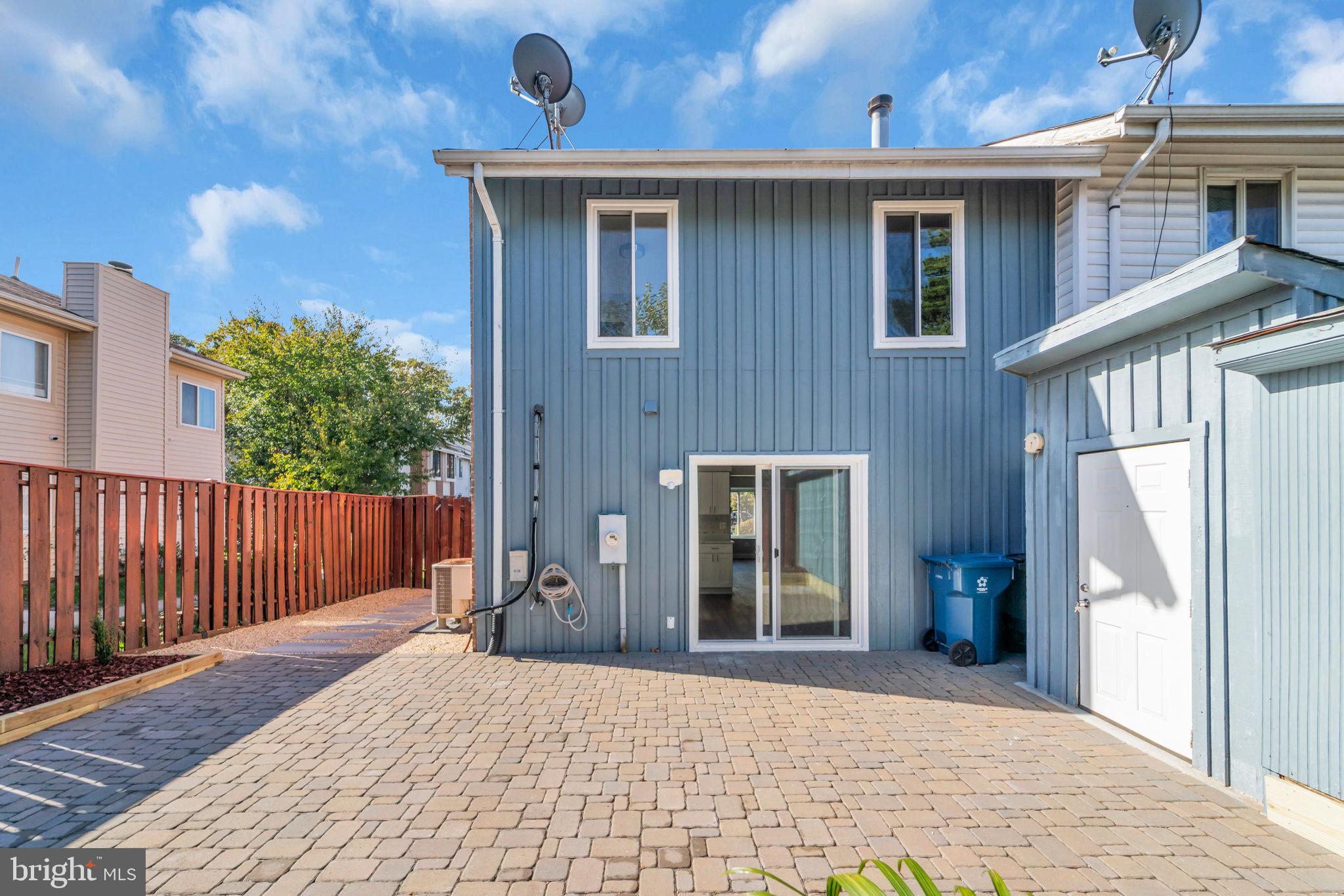 13314 Apgar Place Herndon, VA 20170 - Photo 34 of 39 a front view of a house with a yard