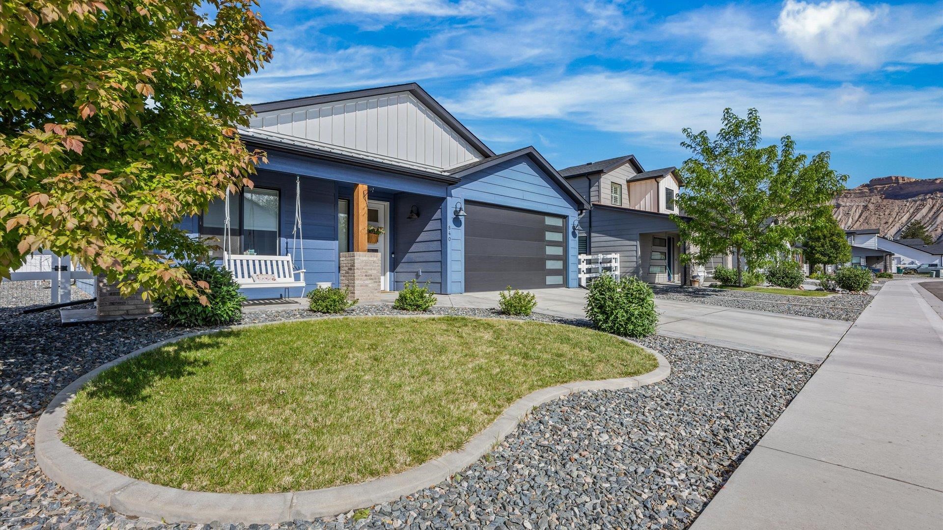 840 Rupp Avenue Palisade, CO 81526 - Photo 2 of 27 a view of a house with a small backyard