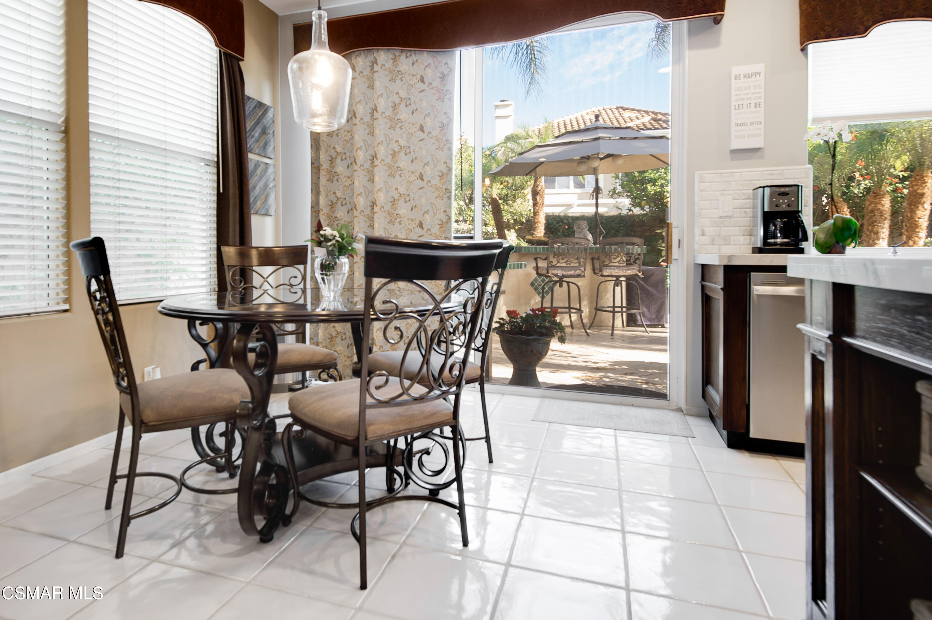 4348 Timberdale Road Moorpark, CA 93021 - Photo 13 of 35 a dining room with furniture and large windows
