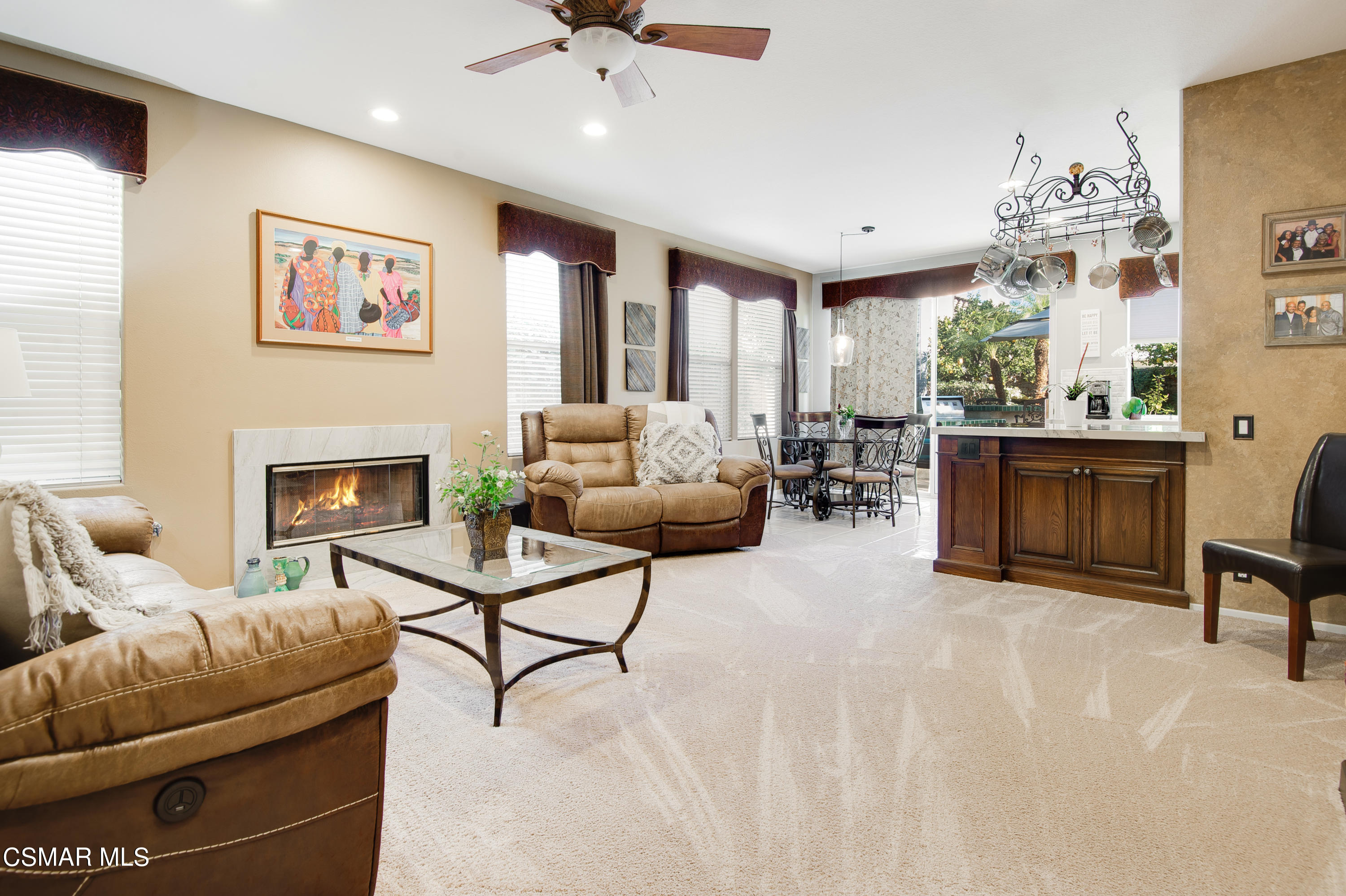 4348 Timberdale Road Moorpark, CA 93021 - Photo 14 of 35 a living room with furniture and a fireplace